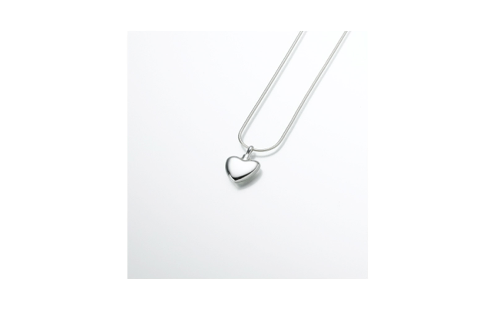 Small Sterling Silver Heart Pendant Measures 3/4"W x 3/4"H, Chain not included, $150