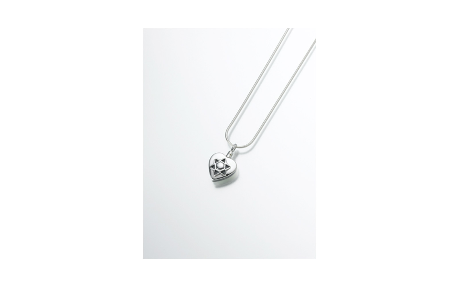 Sterling Silver Star of David Measures 13/16"W x 13/16"H, Chain not included, $195