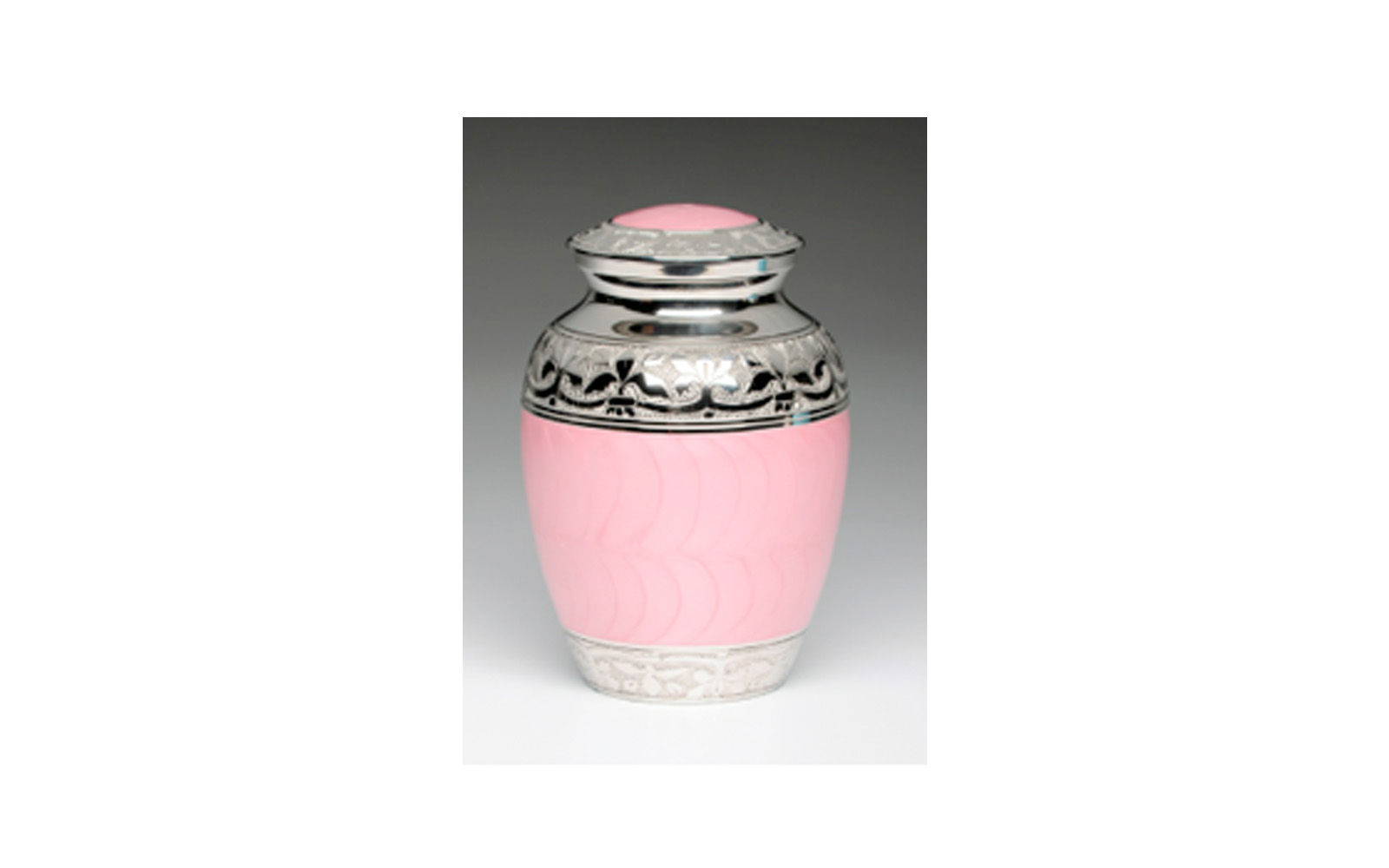 Baby Pink & Baby Blue This urn comes in either Baby Pink (shown) or Baby Blue Enamel over Nickel Plated Brass. It has a Threaded Lid and a Felt-lined base. Comes in Medium, Small, XSmall, and Keepsake (see keepsakes) sizes. Medium: Measures 7.5” H, 70 Cu. Inches, up to 65 lbs., $78 Small: 5.5” H, 30 Cu. Inches, up to 25 lbs., $60 XSmall: 4.25” H, 15 Cu. Inches, up to 10 lbs, $50
