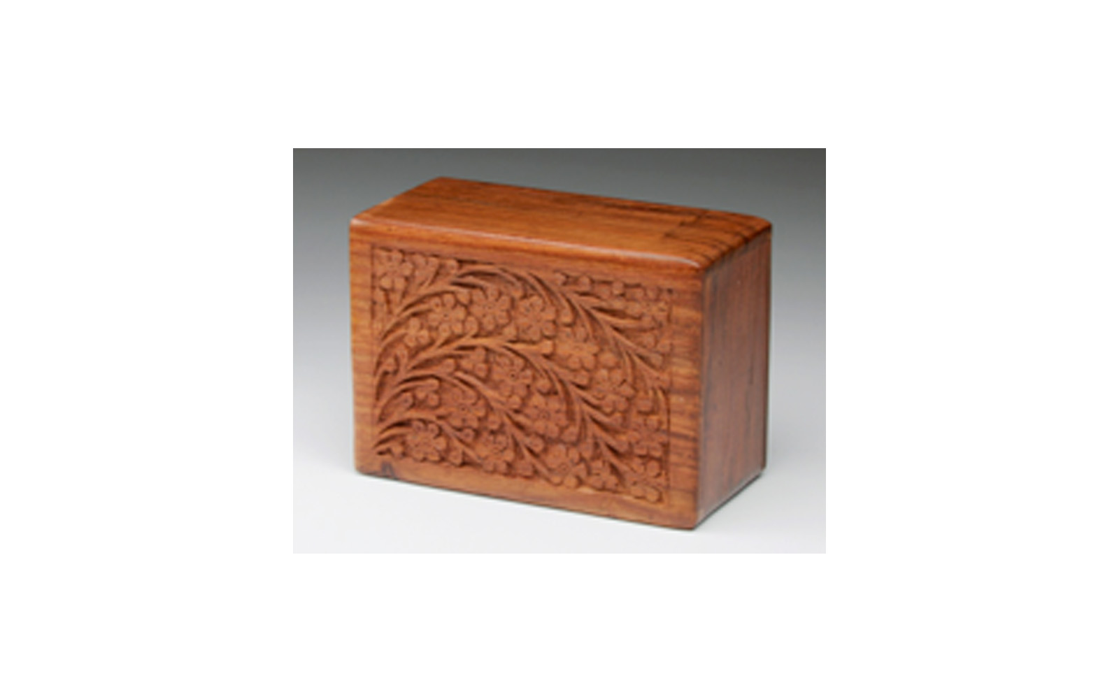 Tree of Life This urn is hand carved and made of solid rosewood. This urn has a slide out base and is available in XLarge, Large, Medium, Small, and XSmall sizes. XLarge: Measures 9.5” L x 6.5” W x 5" H, 218 Cu. Inches, up to 213 lbs., $75 Large: Measures 9” L x 6.5” W x 4.5” H, 185 Cu. Inches, up to 180 lbs., $65 Medium: Measures 7" L x 5" W x 3.75” H, 70 Cu. Inches, up to 65 lbs., $55 Small: Measures 6" L x 4" W x 2.75” H, 30 Cu. Inches, up to 25 lbs., $45 XSmall: Measures 5" L x 3" W x 2" H, 10 Cu. Inches, up to 5 lbs., $35