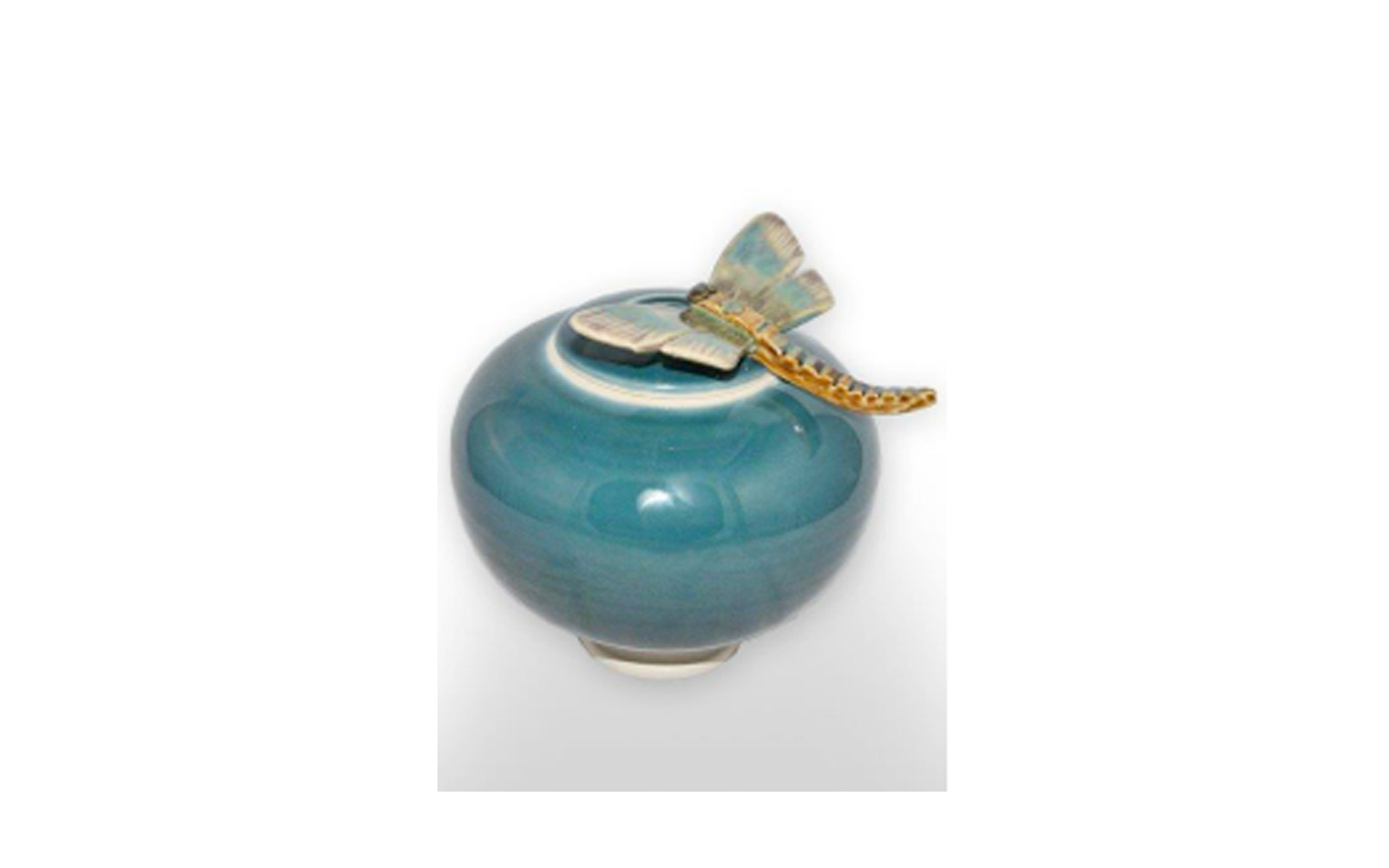 Dragonfly Peacock Ceramic Urn This Beautiful Glazed ceramic urn measures 5 ½” L x 5 ½” W x 6” H and holds 48 Cu. Inches, up to 48 lbs. $200 *Please Note: Each piece is uniquely made by its Artist resulting in different colors and weight