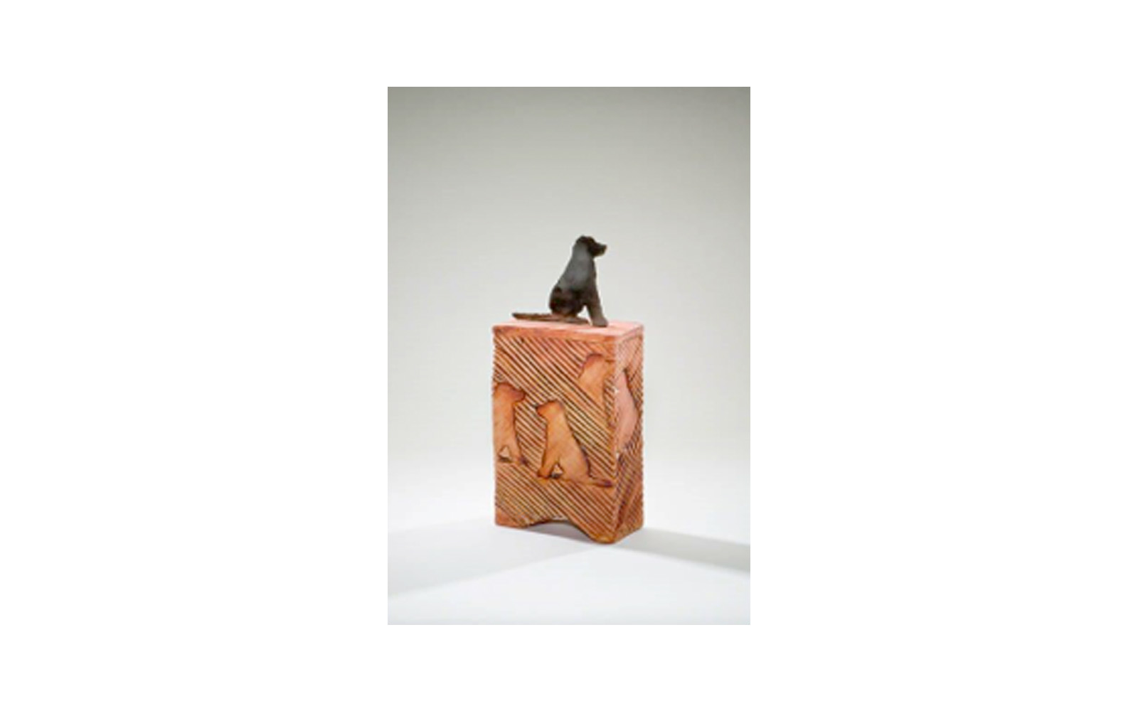 Stay Ceramic Dog Cremation Urn This ceramic urn is Unique, Vibrant, and Displays the Obedience and Loyalty of the Dog. This urn has a Custom Metal Dog Cut Handle used to imprint the sides of the urn. This urn measures 5 ½” L x 2 ½” W x 12” H, 60 Cu. Inches, up to 60 lbs. $390 *Please Note: Each piece is uniquely made by its Artist resulting in different colors and weight