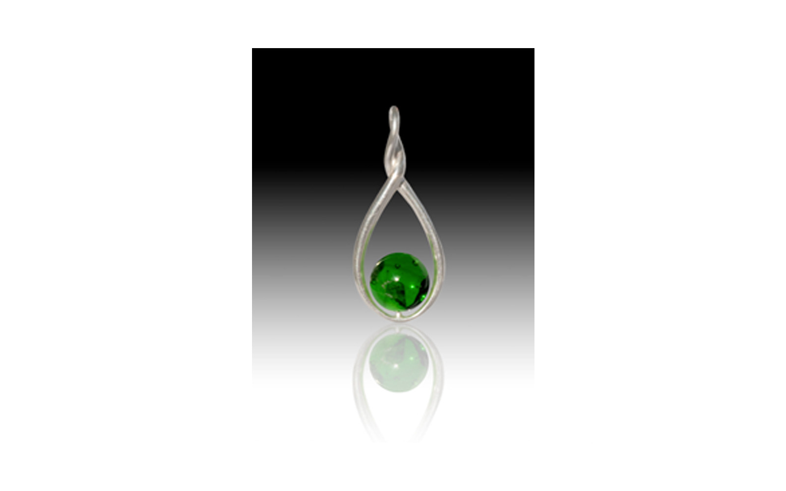 Melody Twist Pendant This Solid Sterling Silver pendant has a touch of elegance by combining Sterling Silver and a 9mm glass pearl containing your loved one's cremated remains. This pendant’s bail opening measures 3.1mm and its dimensions are 33 x 14mm. This keepsake comes in Red, Orange, Yellow, Green, Blue, Purple, Lavender, Pink, Gray, Black, and Turquoise $195
