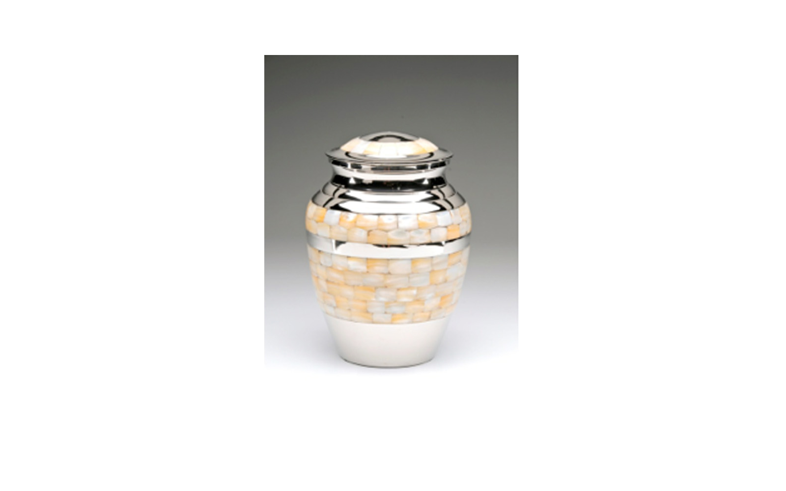 Mother of Pearl Nickel Plated Brass This Nickel Plated Brass urn comes with a Beautiful Mother of Pearl Inlay, Threaded Lid, and a Felt-Lined Base. Comes in XLarge, Large, Medium, Small, and Keepsake (see keepsakes) sizes. XLarge: Measures 7" D x 9.5” H, 220 Cu. Inches, up to 215 lbs., $160 Large: Measures 5.5" D x 8.5" H, 110 Cu. Inches, up to 105 lbs., $125 Medium: Measures 7.25"H, 70 Cu. Inches, up to 65 lbs., $85 Small: Measures 5" H, 40 Cu. Inches, up to 35 lbs., $72