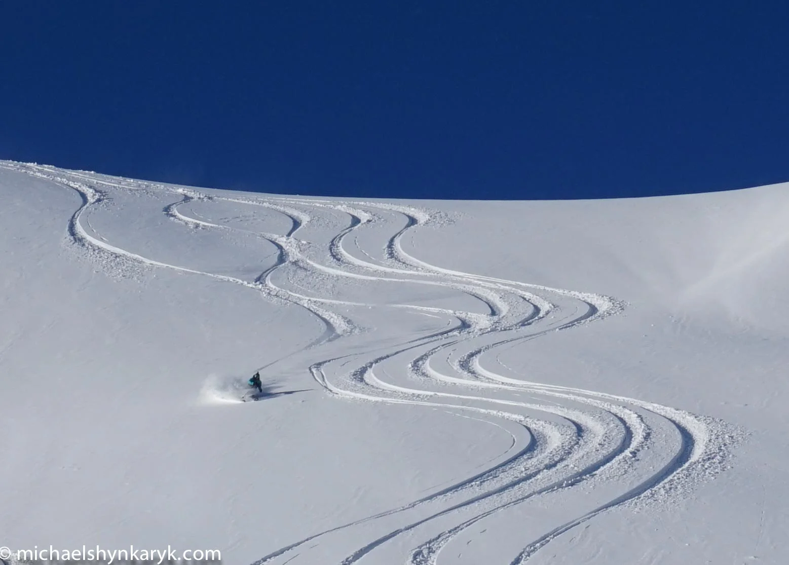 It's nice when skiers/snowboarders follow my directions perfectly!  Southern Lakes Heli-Skiing, New Zealand.