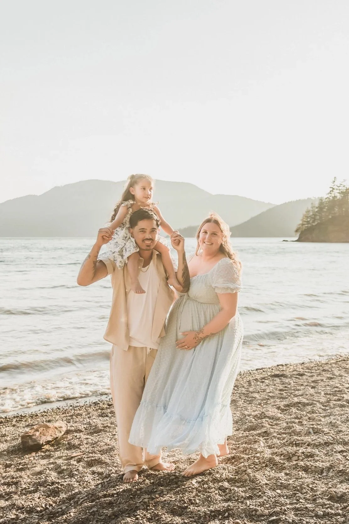 maternity session Harrison lake - mom dad and 4 year old sibling at golden hour