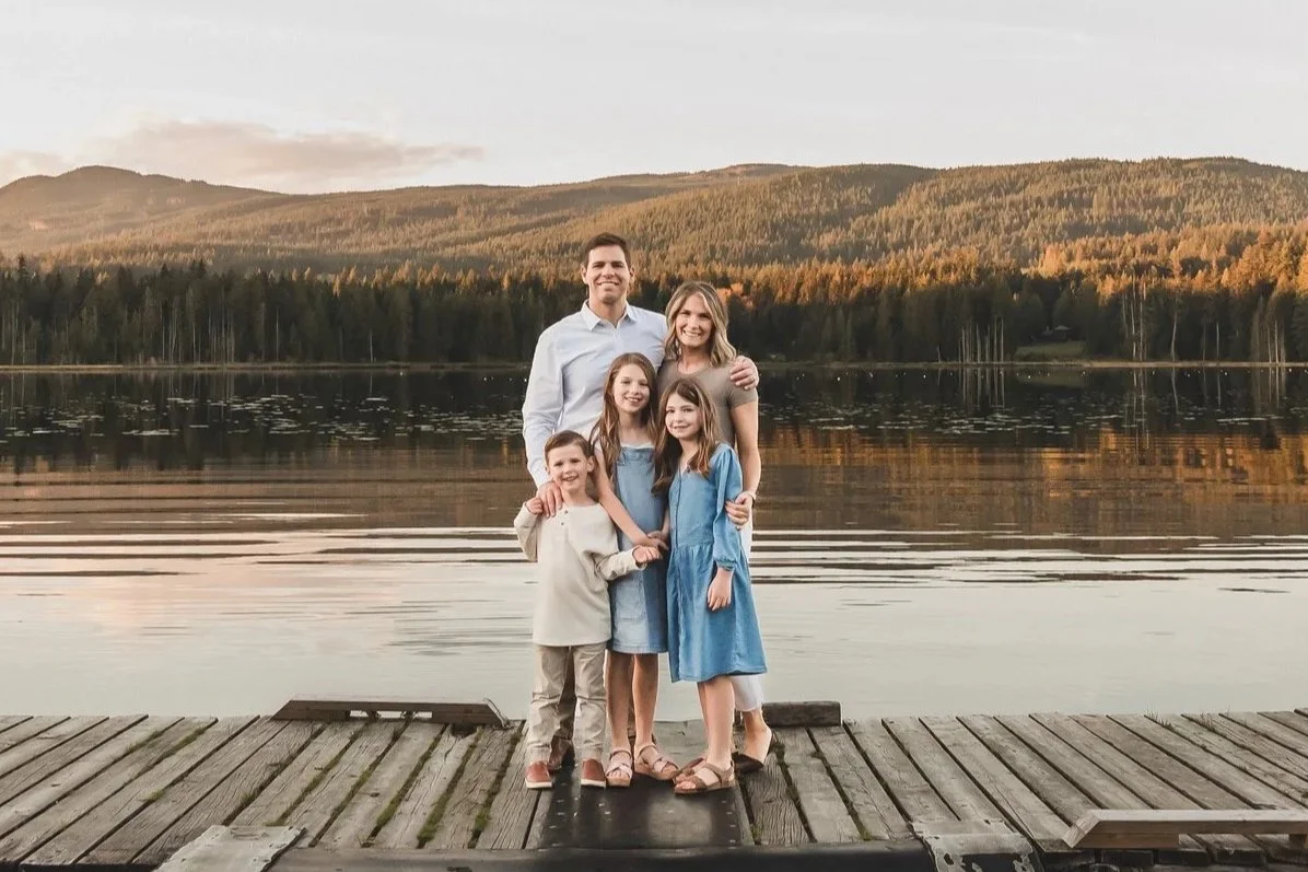 family of 5 at sunset whonnock lake dock gorgeous mountain and lake setting pre teens