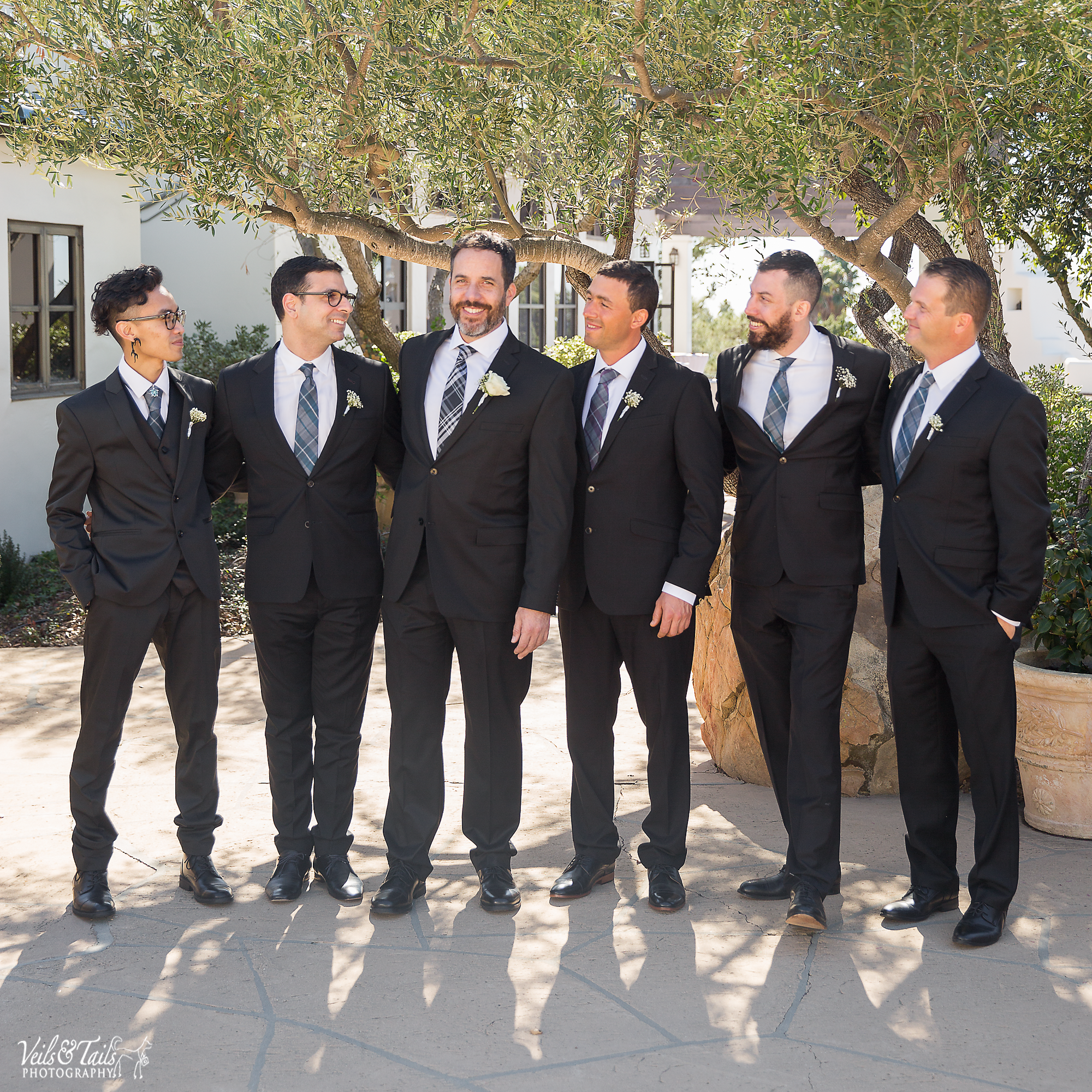 groomsmen with purple ties