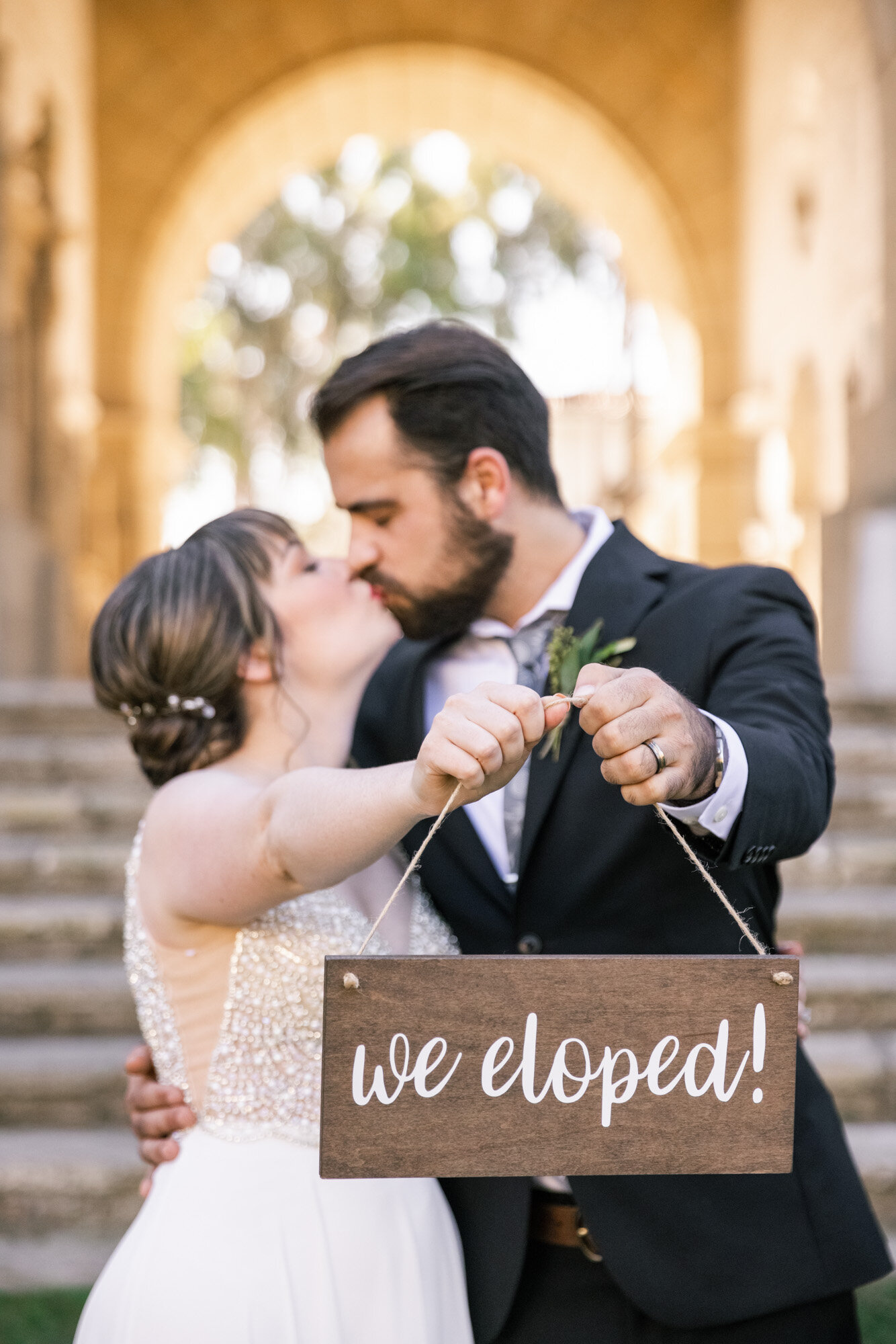 Elopement photography Santa Barbara Courthouse with sign