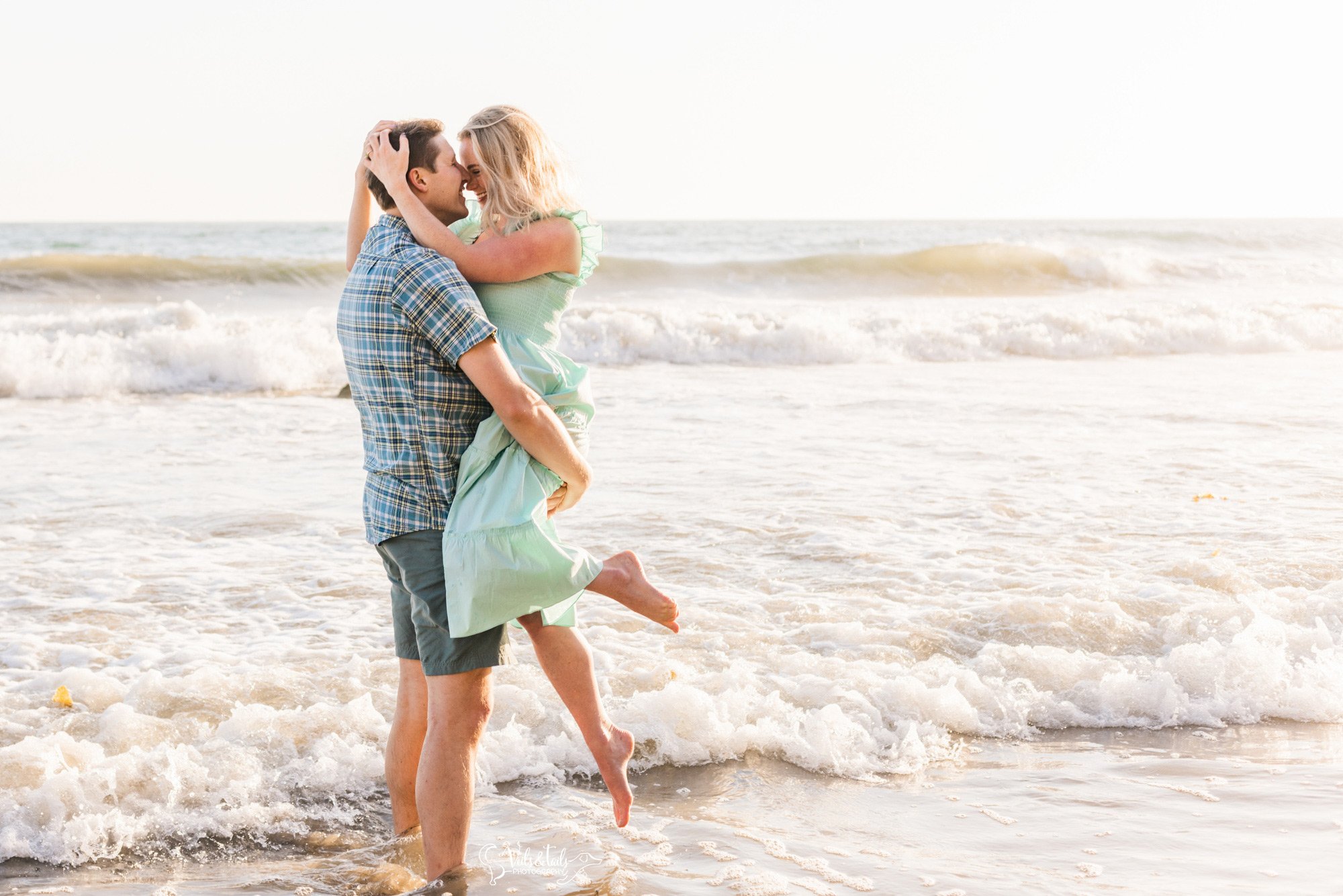 Santa Barbara photographer, beach engagement session action