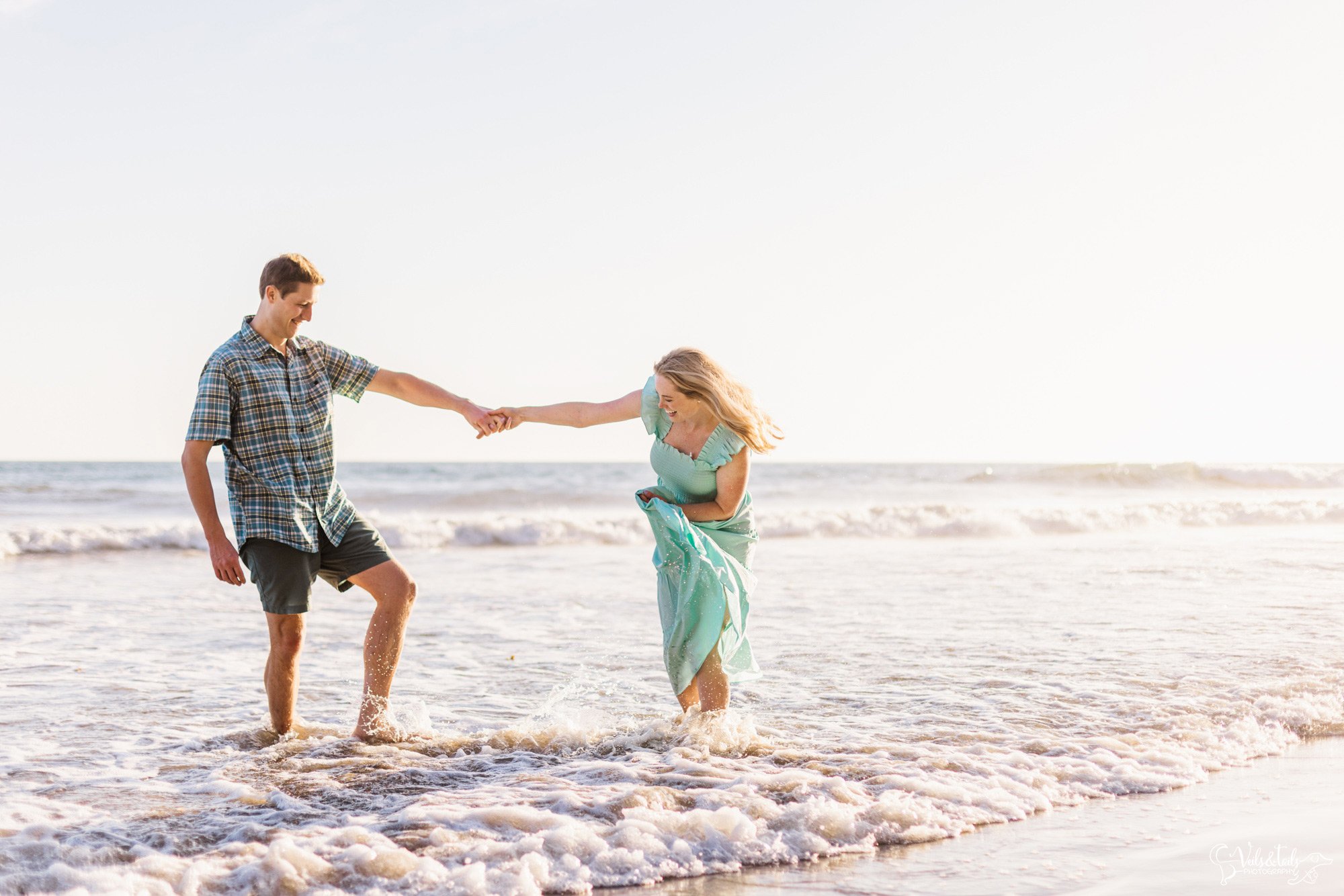 Santa Barbara photographer, beach engagement session in the waves