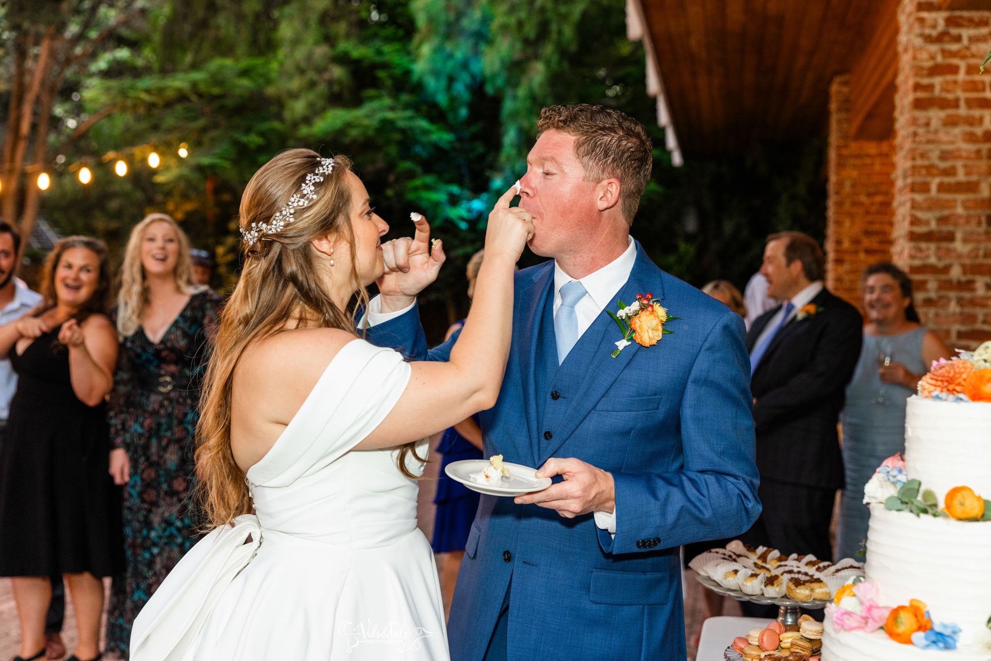 1880 Union Wedding cake cutting by Veils & Tails Photography