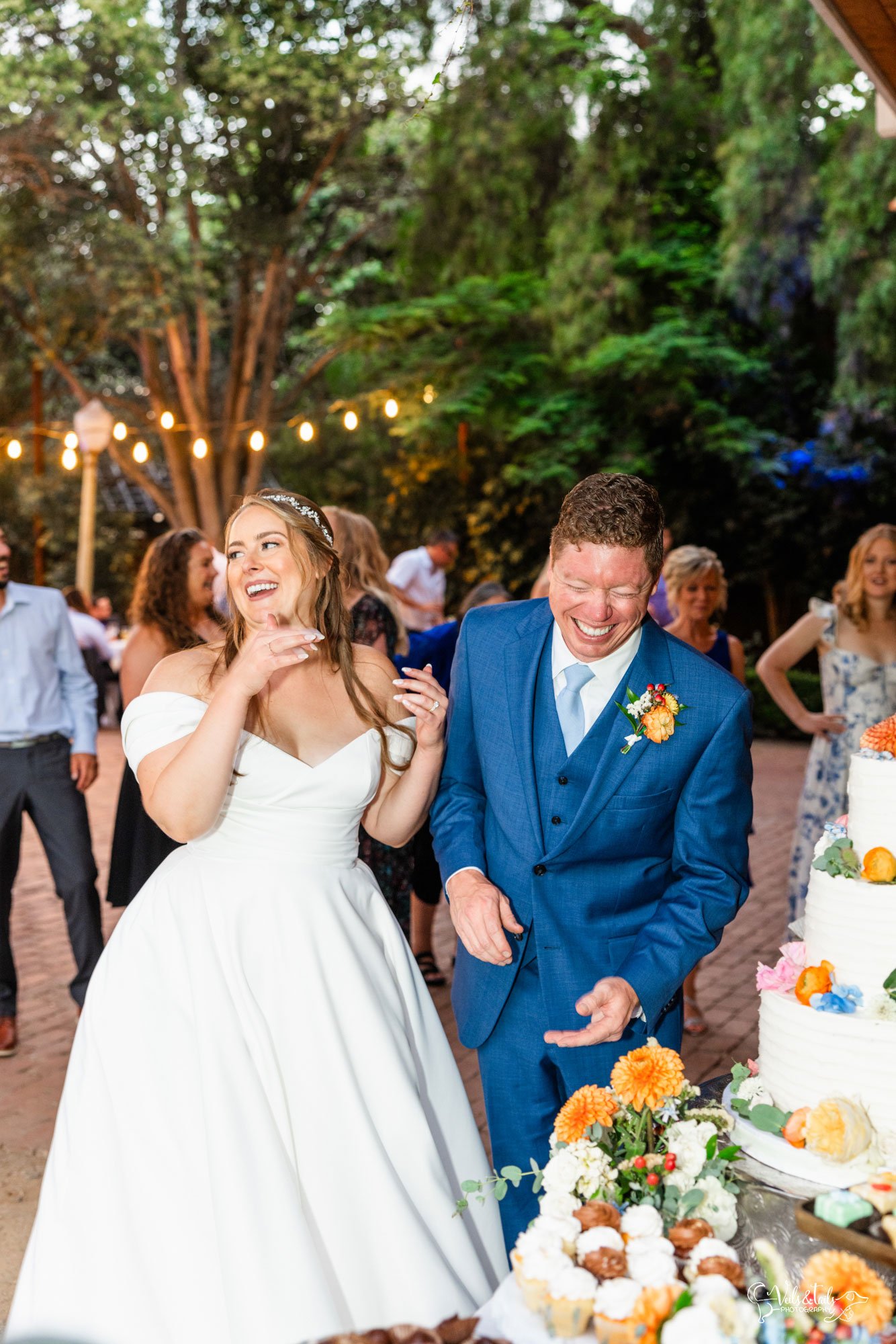 1880 Union Wedding cake cutting by Veils & Tails Photography