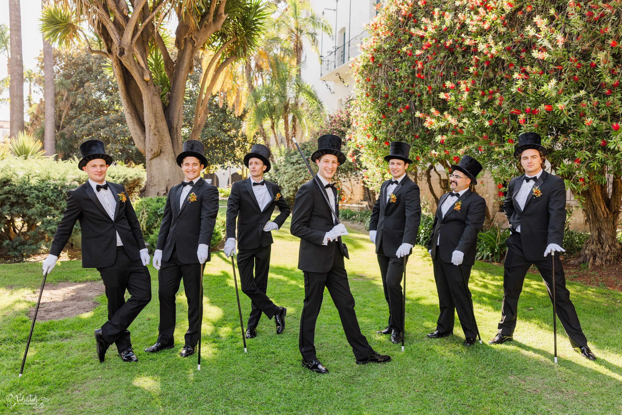 joyful Santa Barbara Wedding Photographer Courthouse groomsmen in tophats