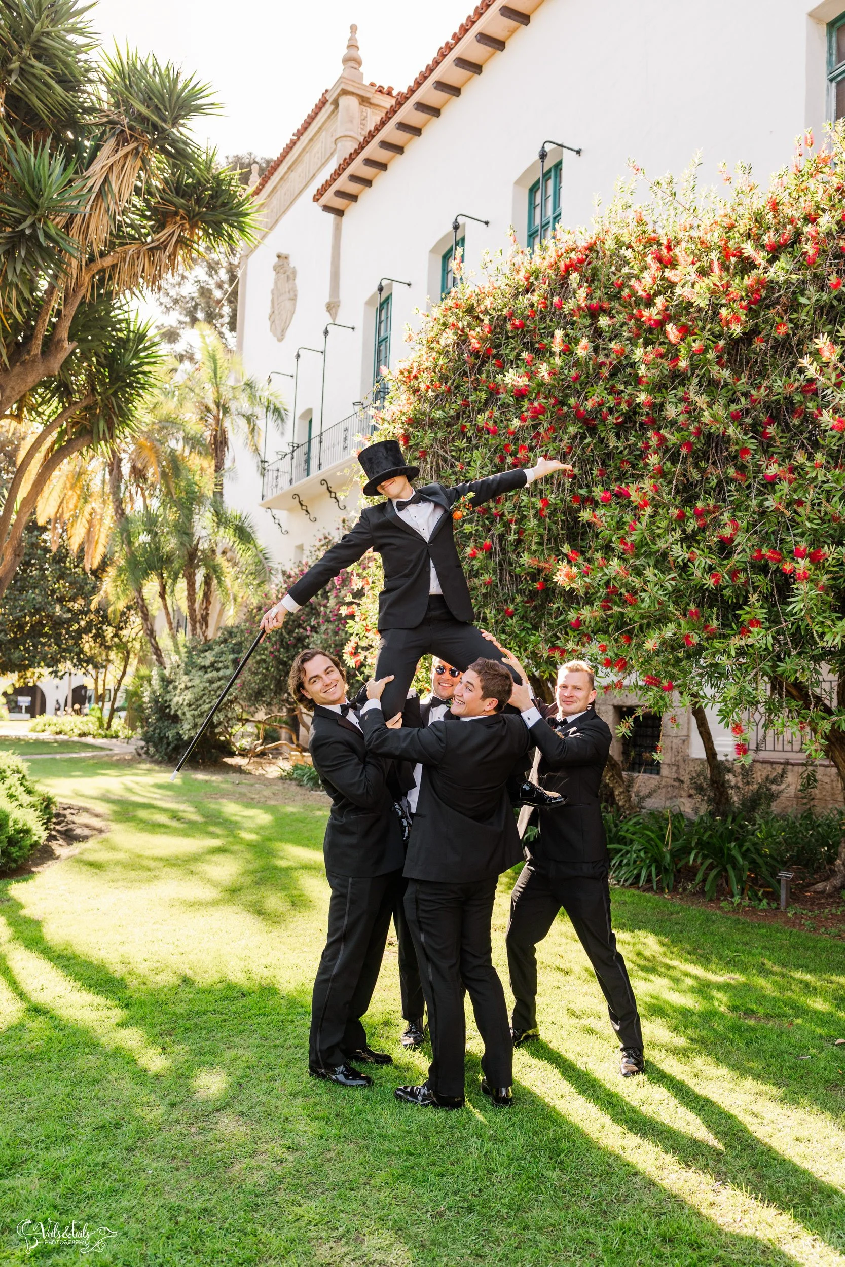 joyful Santa Barbara Wedding Photographer Courthouse groomsmen fun