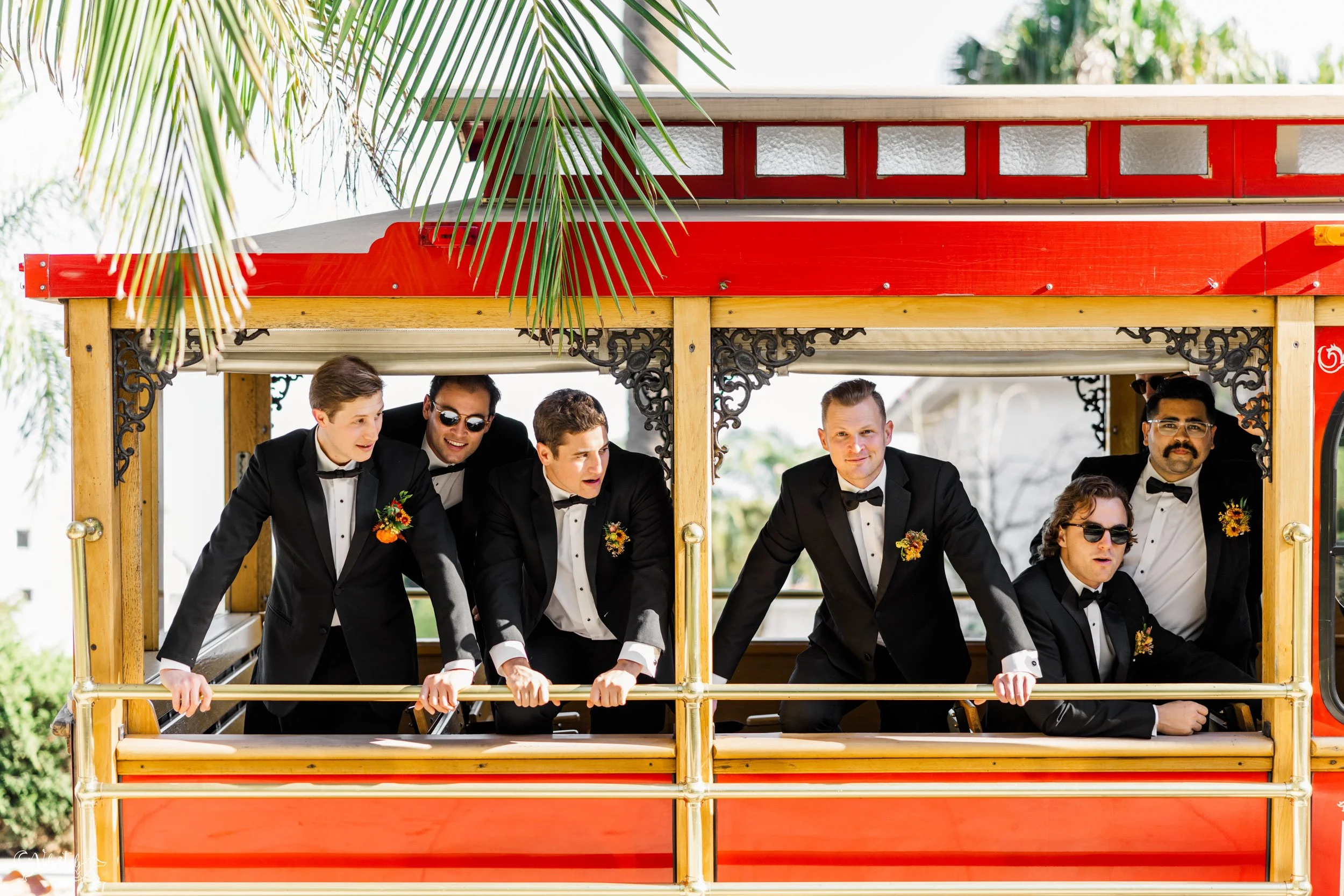 joyful Santa Barbara Wedding Photographer Courthouse trolley bridal party