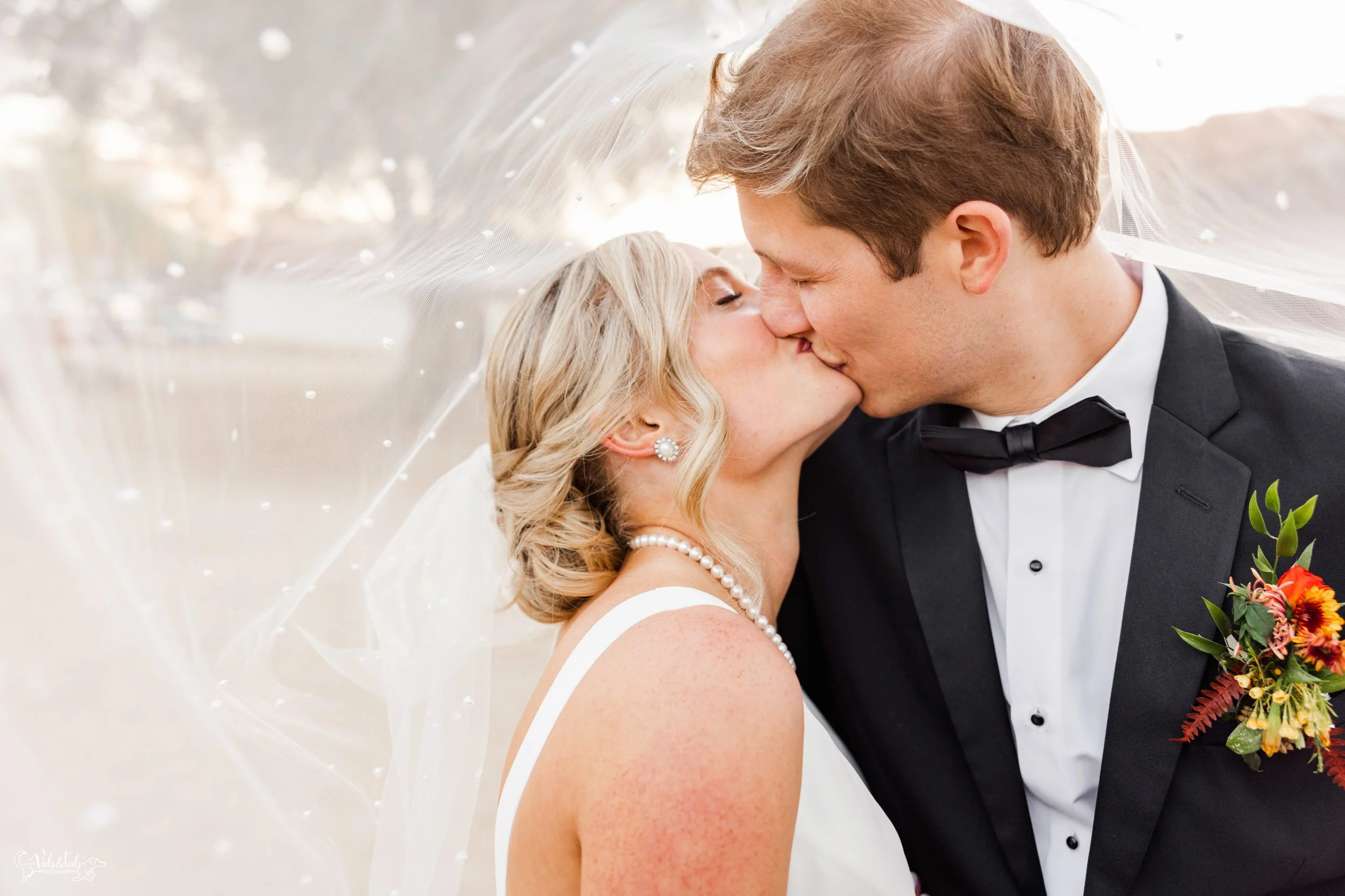 bright airy Santa Barbara Presidio Wedding Photographer in the veil