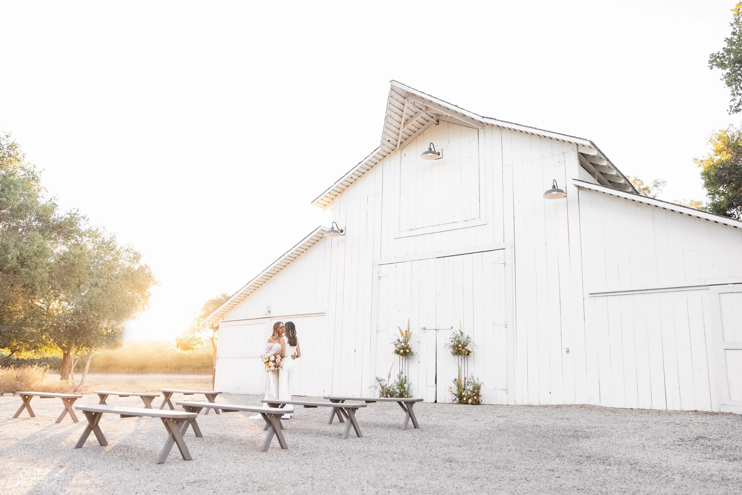 LGBTQ+ wedding photography; white barn ceremony at Lieff Ranch in Santa Ynez, Veils &amp; Tails Photography