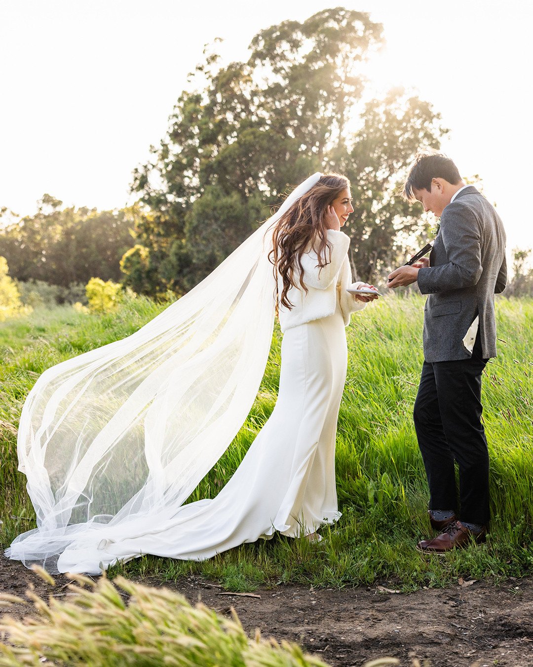 Nature put on such a beautiful show for this intimate spring wedding. We hiked through wind, mud and rainbows to get to their ceremony site, the couple having trudged through the day before to lay down wood planks to make sure their guests could trav