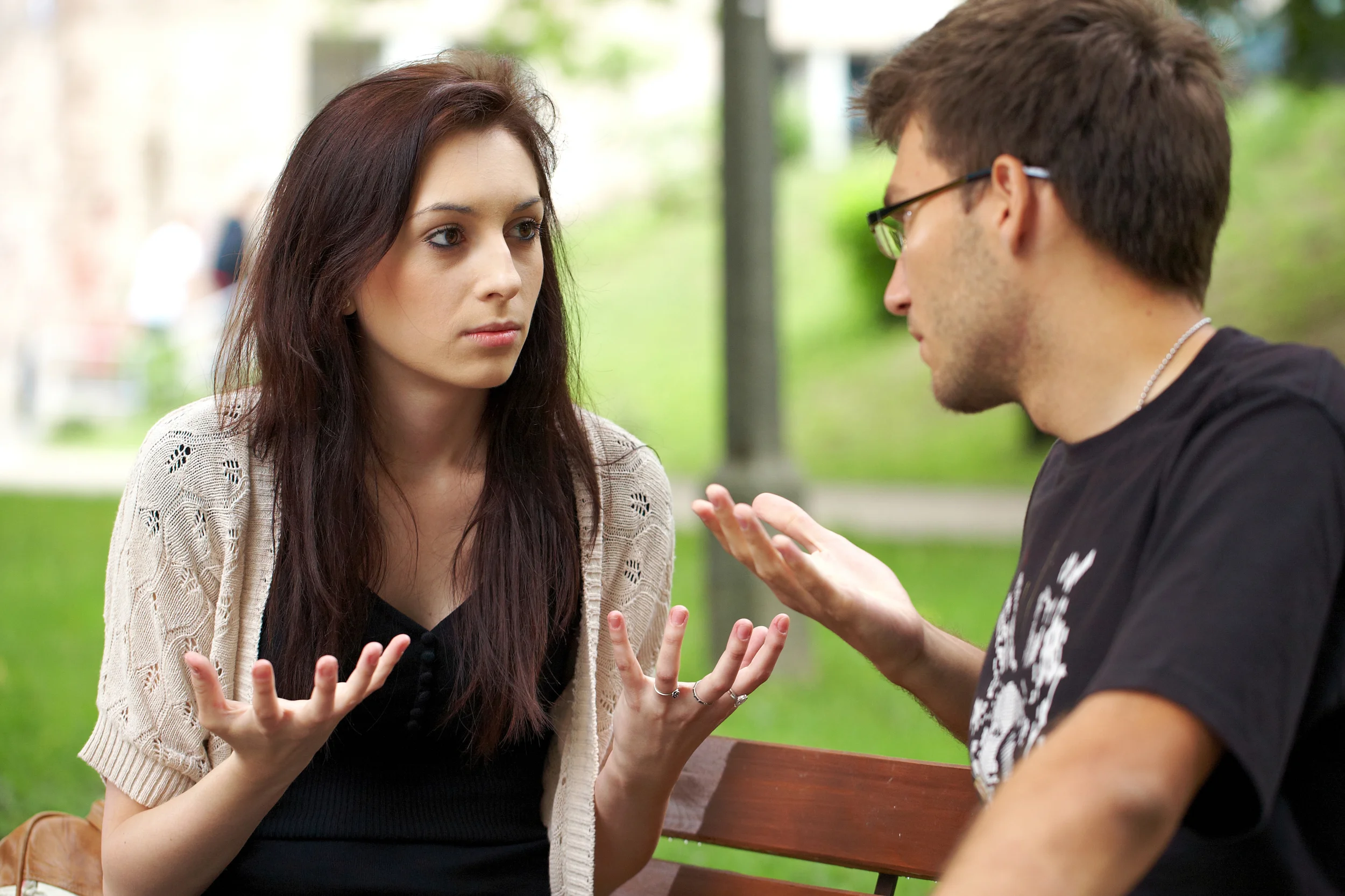 woman and man discussing irritating behaviors