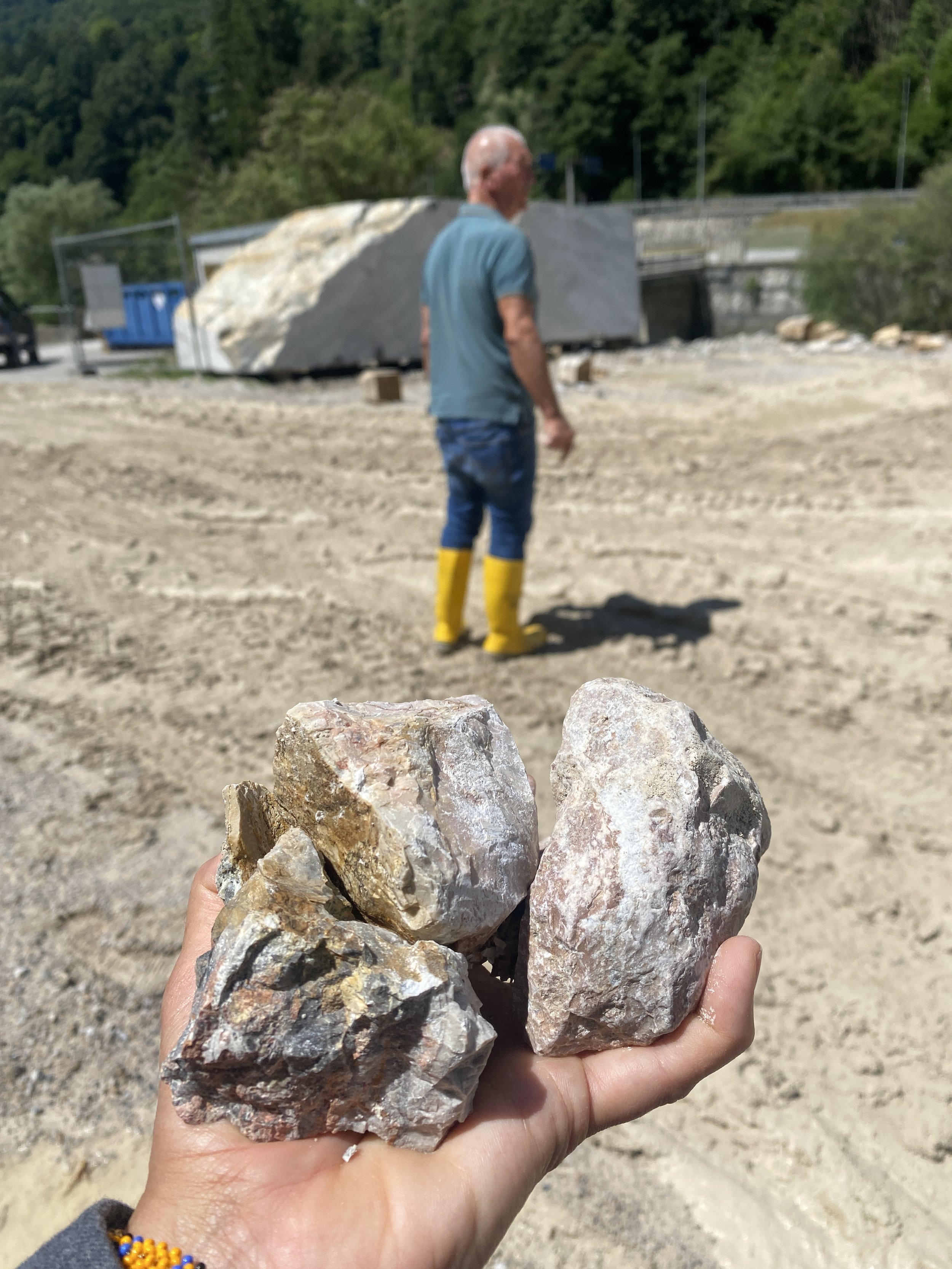 a local Arabescato Orobico mine Italy, Bergamo, gathering rocks for gum arabic pigment