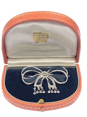 Cartier Platinum Diamond Bow Brooch — Antique Jewelry NYC