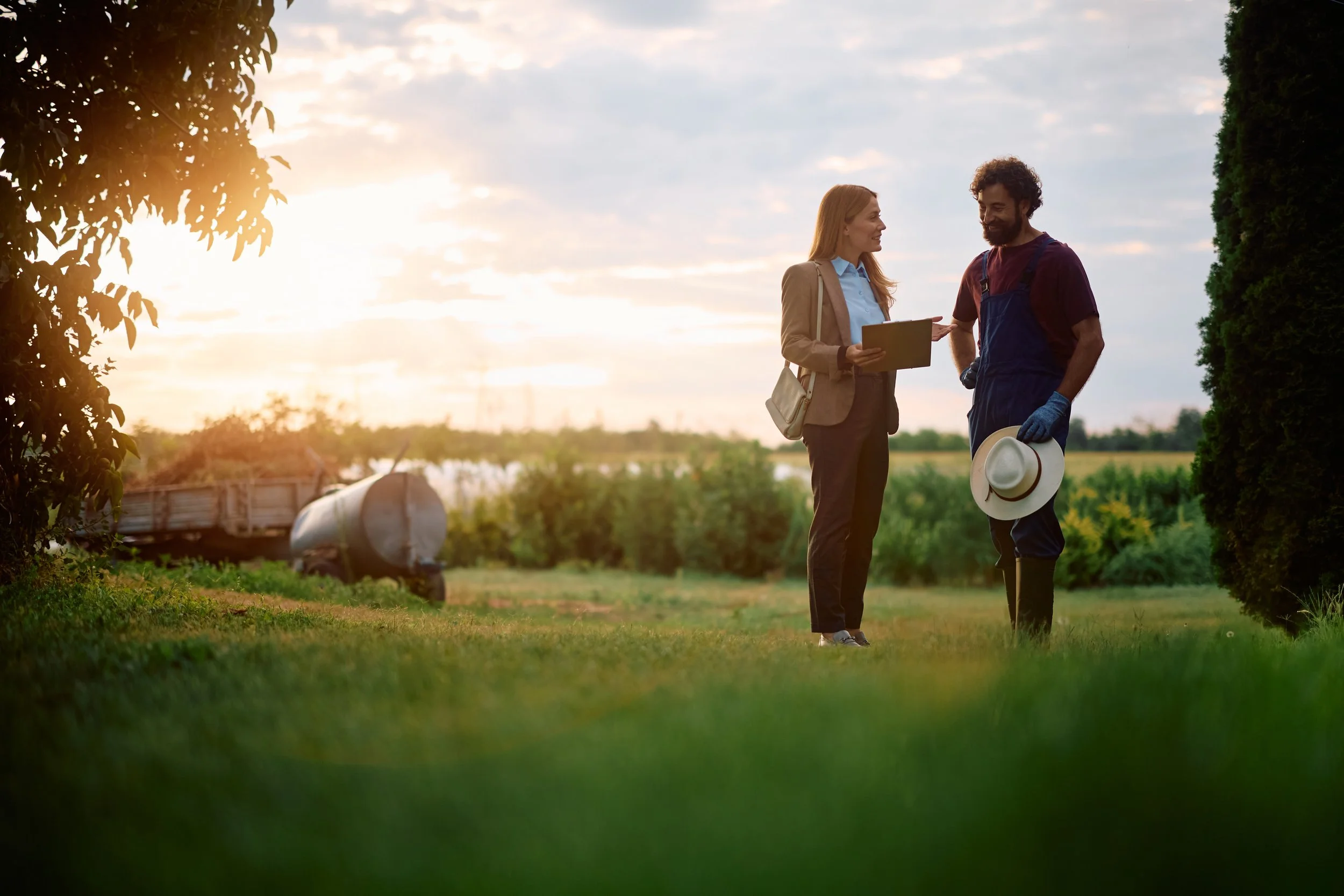 A farmer discusses future plans with a financial planner.