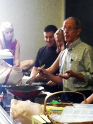 Dr. Van Cotter teaching students in the UNC biology course "The Physician's Garden" how to properly identify and cook fungal specimens.