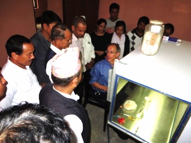Dr. Cotter teaching people how to grow mushrooms for commercial purposes in the Nepal government's new mycology lab. Photo courtesy of Dr. Cotter.