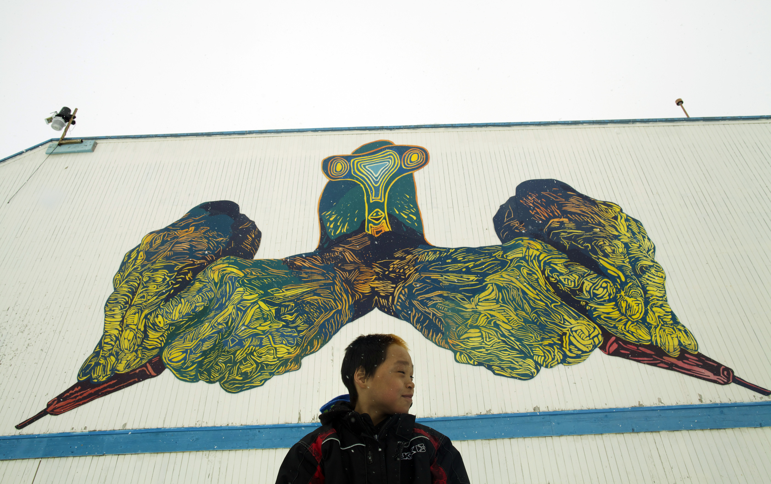   MINE YOUR IMAGINATION, Cape Dorset, Nunavut, Canada,&nbsp;2014-2015   18x36', latex on mounted plywood   We created the hans in the mural by making original linocut prints, and projecting and painting them cut-for-cut: our way of giving a nod to th
