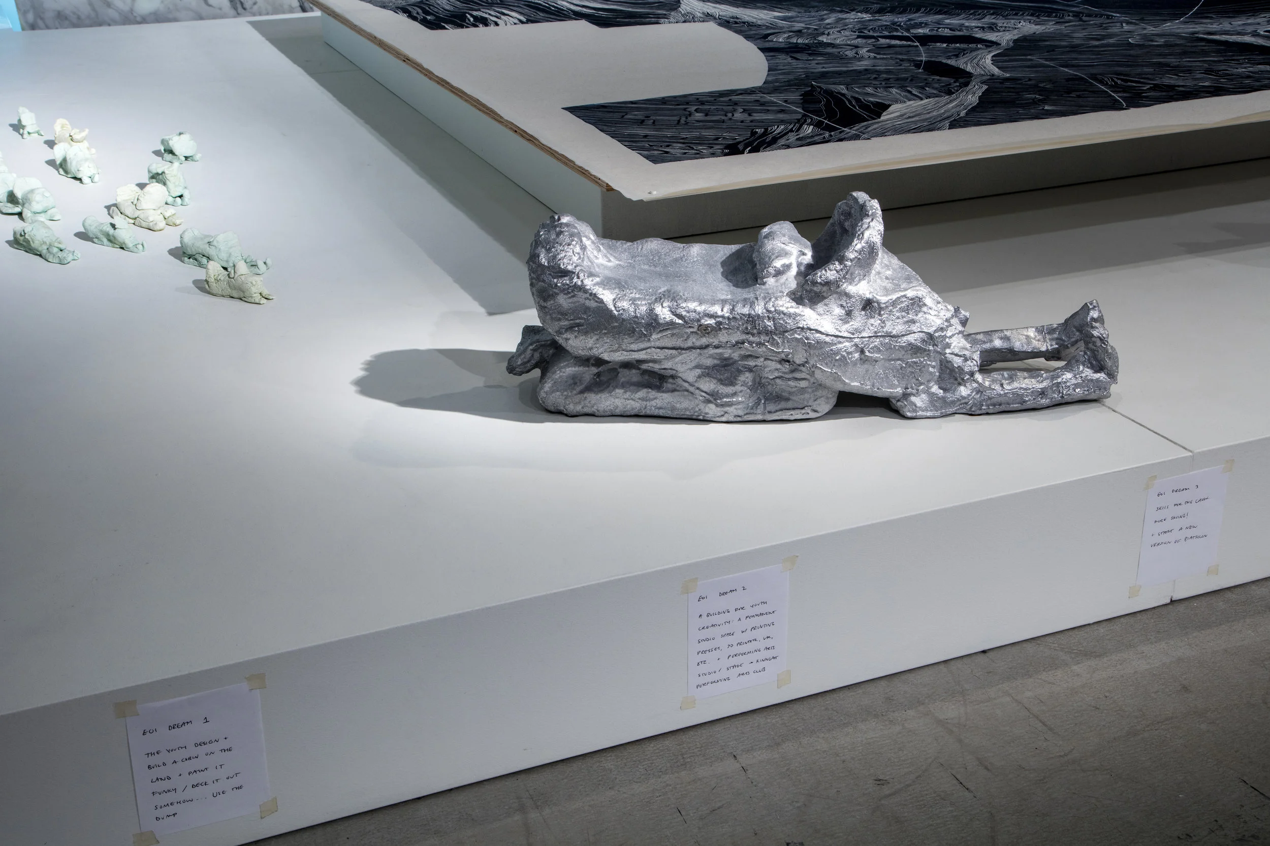 Playdough snowmobiles, aluminum cast of playdough snowmobile by David Pudlat and Moe Kelly (age 12), handwritten notes of Embassy of Imagination dreams, playdough originals