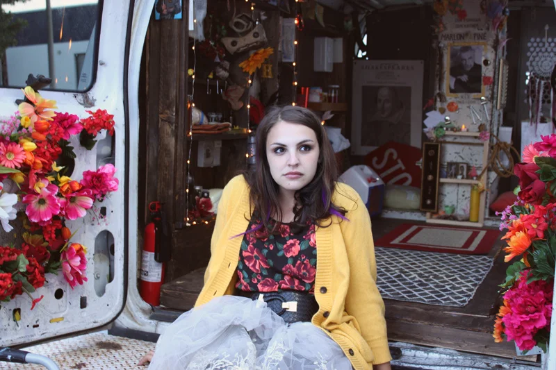 A gorgeous shot from the production. Roses were a theme in the van and on the postcard!