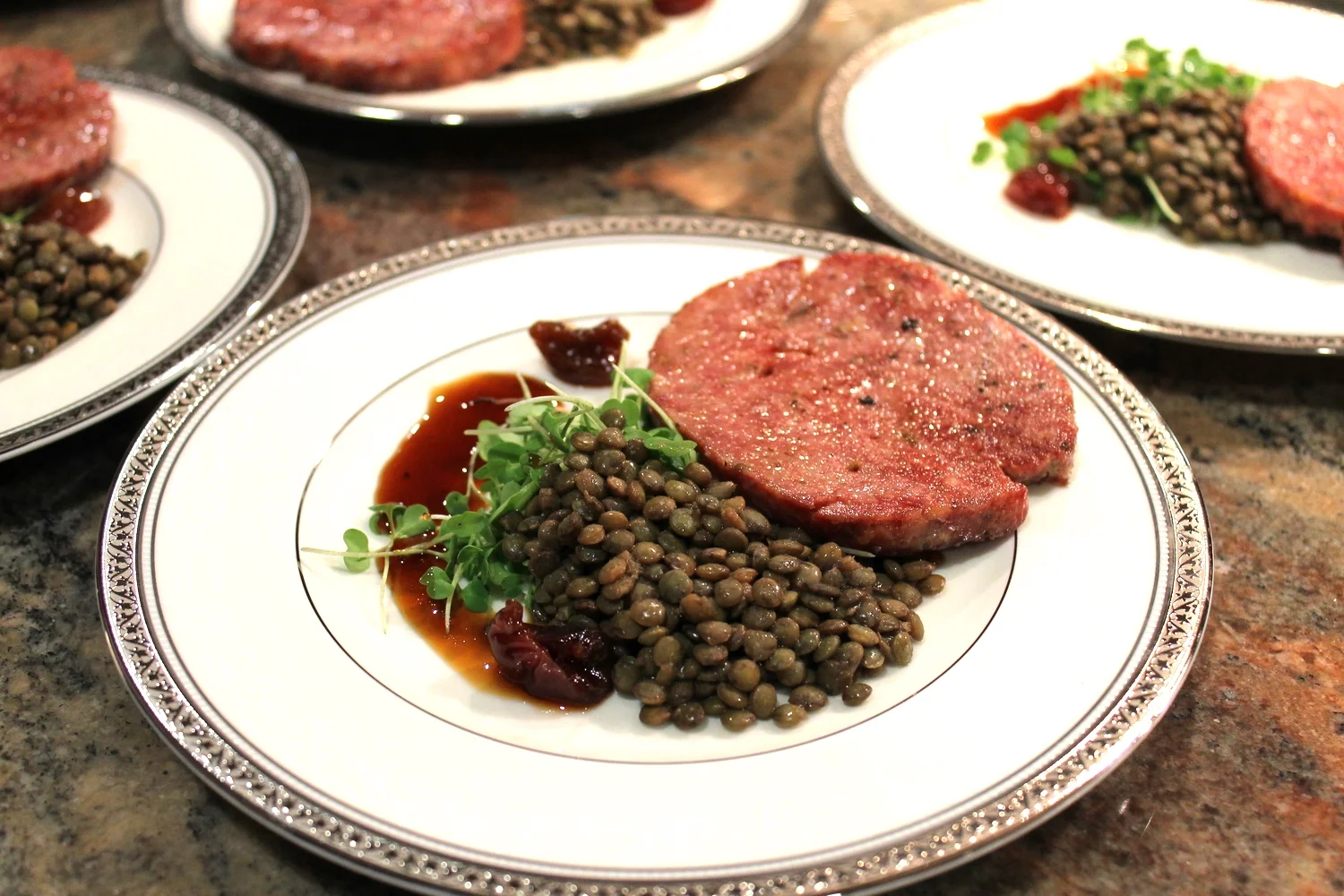 Cotechino with lentil and cherry reduction