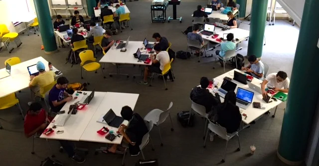 A view of ELEC 220 students working during a lab.