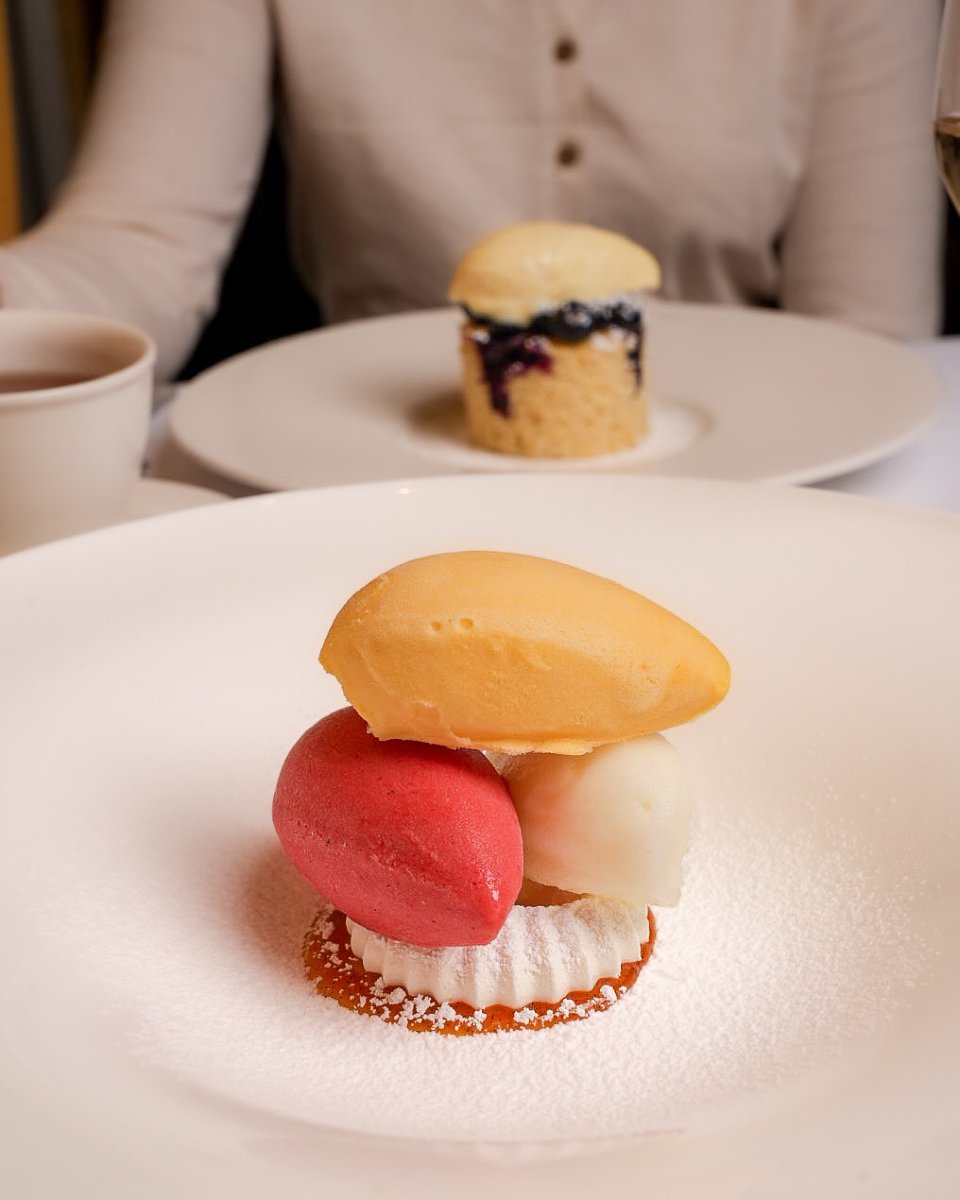 A trio of fresh sorbets &mdash; passion fruit, raspberry, and Meyer lemon&mdash;served with crisp meringue 🍋