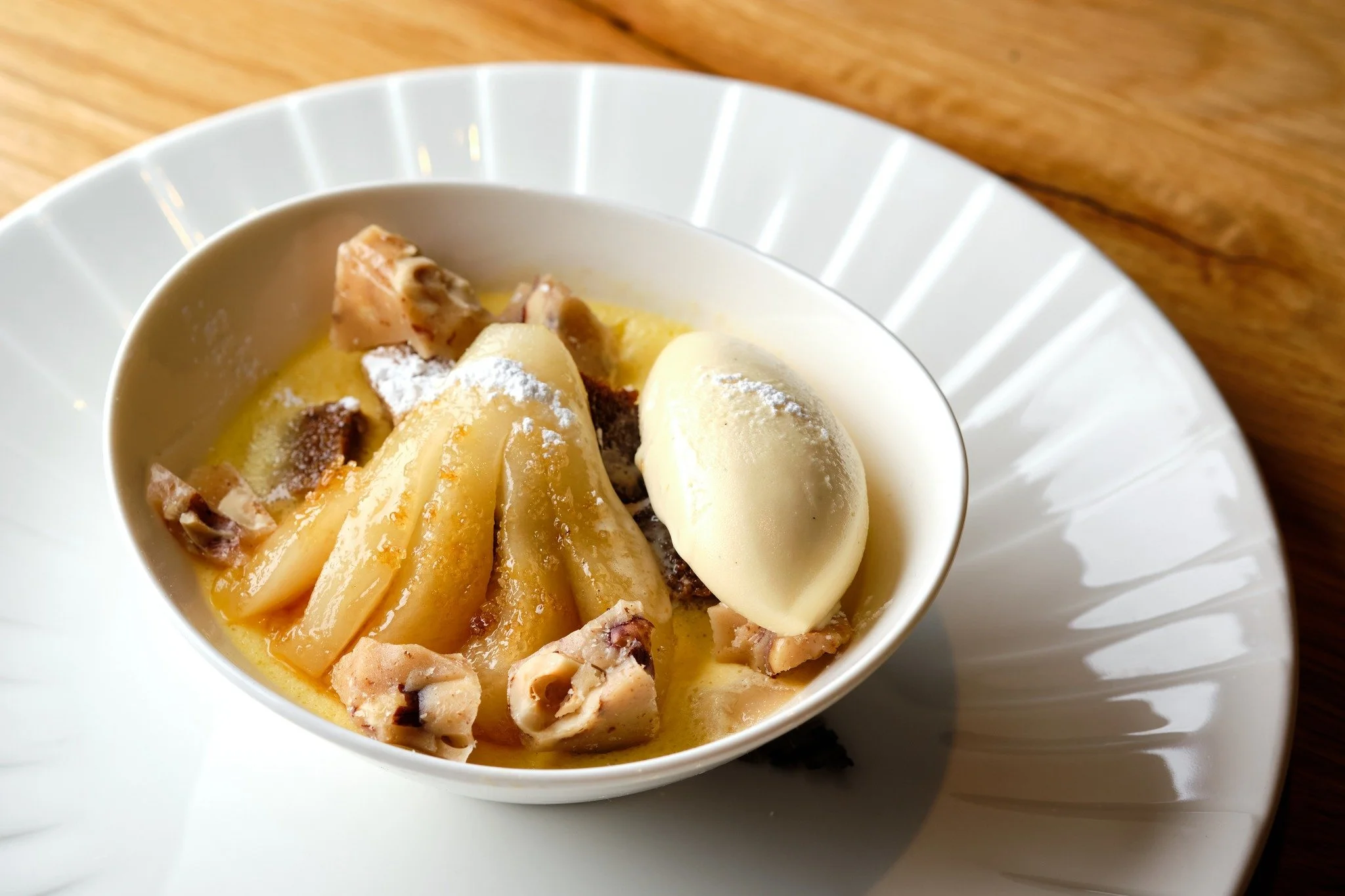 Sweet, spiced and just indulgent enough. This is how we like to end the night. 🍐🤍

pear &amp; ginger bread pudding, bourbon-orange ice cream, hazelnut toffee