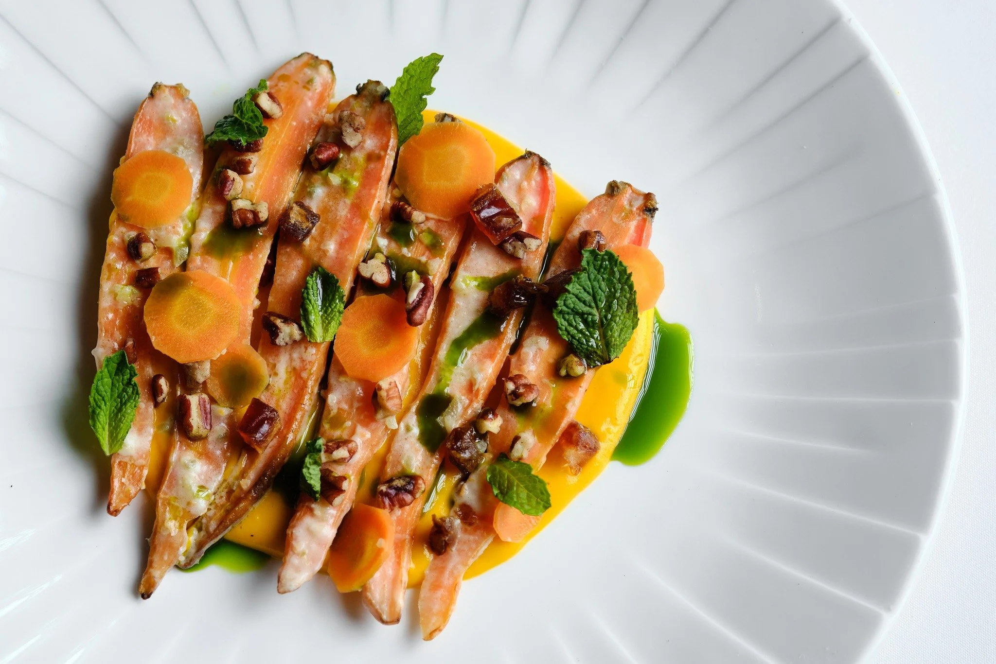 Who doesn't love a good carrot dish? Ours is so special. Try Clem's Carrots with preserved lemon, pickled jalape&ntilde;o, dates, pecans and mint next time you're in.