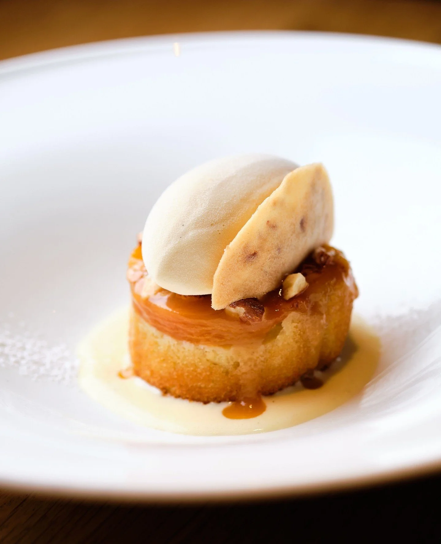 Peak peach season, the Aria way. 🍑⁠
Our peach almond cake celebrates the season with peach ice cream, amaretto anglaise and an almond tuile.⁠