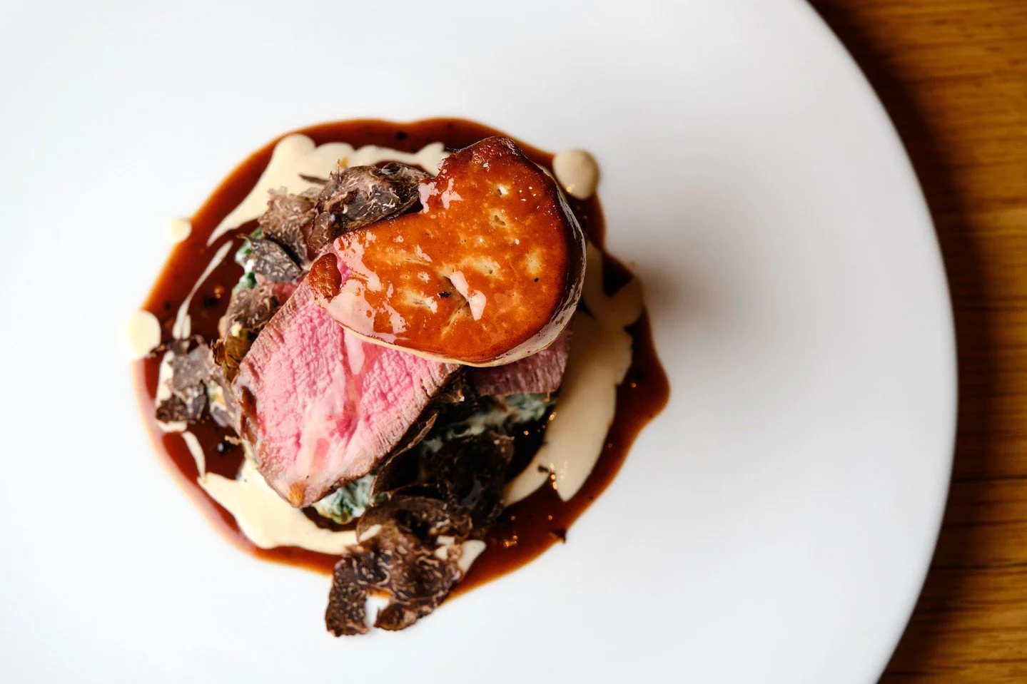 Chef Austin&rsquo;s take on a classic.⁠
Filet &agrave; la Rossini with preserved black truffle, brioche, Comt&eacute;-creamed spinach, foie gras and Madeira jus. Rich, savory and beautifully balanced.