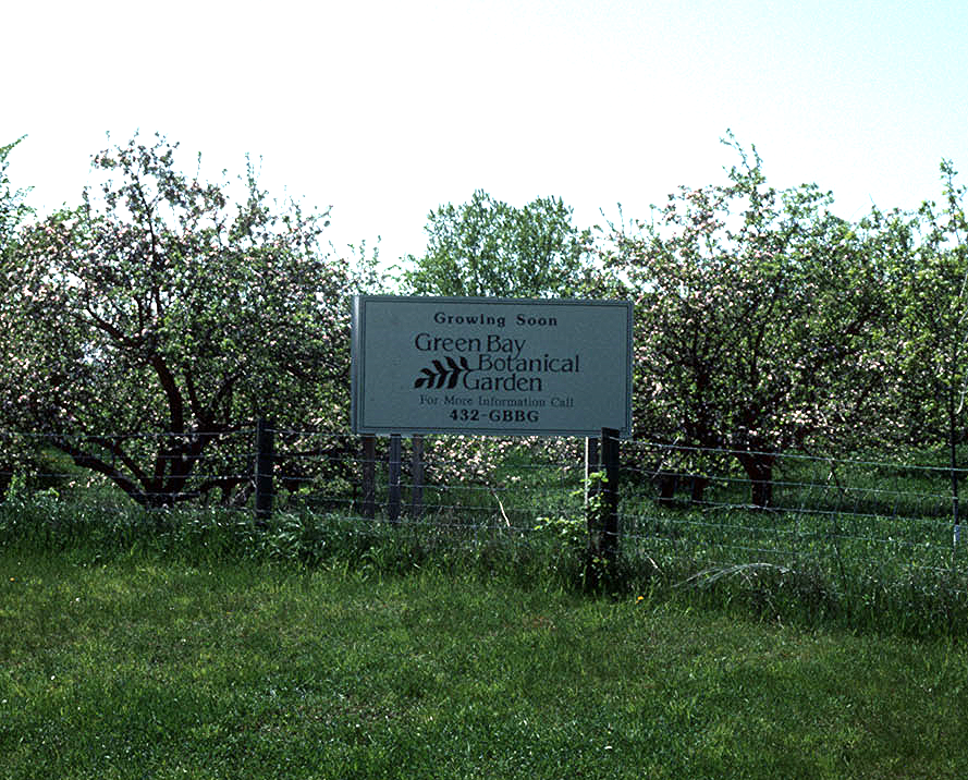 Sign posted in front of the "old Larsen orchard" announcing that the botanic garden was coming soon, 1990's. Source: The Green Bay Botanical Garden .