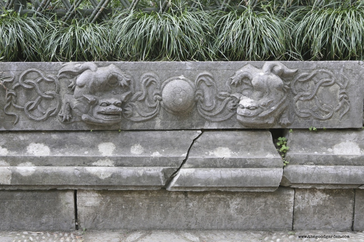  Detail of carved stone planter that defines this space. 