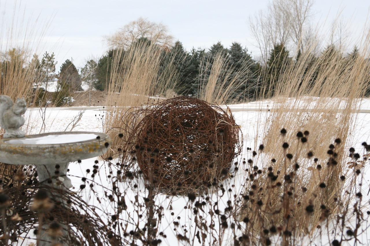  One of a series of barbed wire balls that were originally part of the farm but discarded. &nbsp;As ornaments they connect the garden with its past. 