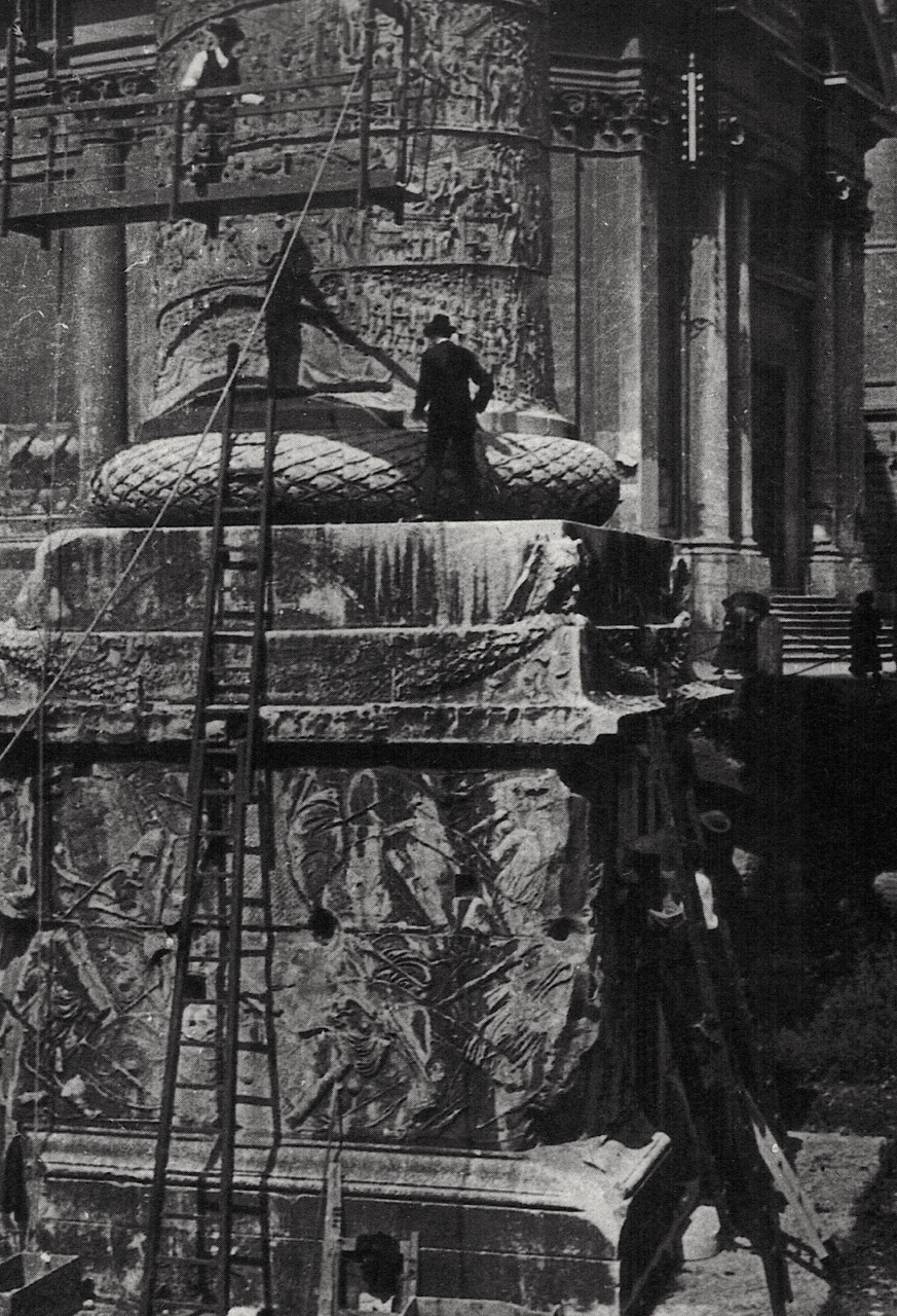 Shutze and colleagues making a rubbing of inscriptions at the base of Trajan's Column, Rome. Source: E.M. Dowling, American Classicist. Smithsonian Institution.
