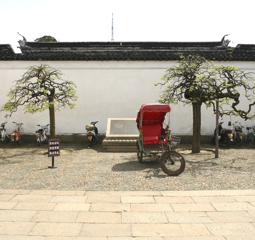 I wondered who had arrived in this bright red rickshaw.