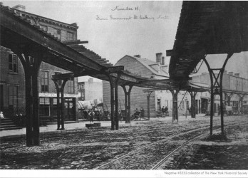 Photo from the 1870's of an elevated train that was one block from where the High Line was later built. Source: The New York Historical Society.