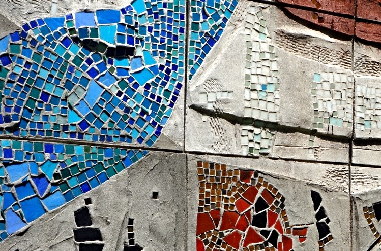 Detail from "Formas Geometricas" (1959) by Raul Martinez fills an entire wall with ceramic tile and concrete.  It defines the space that leads to the main auditorium. 