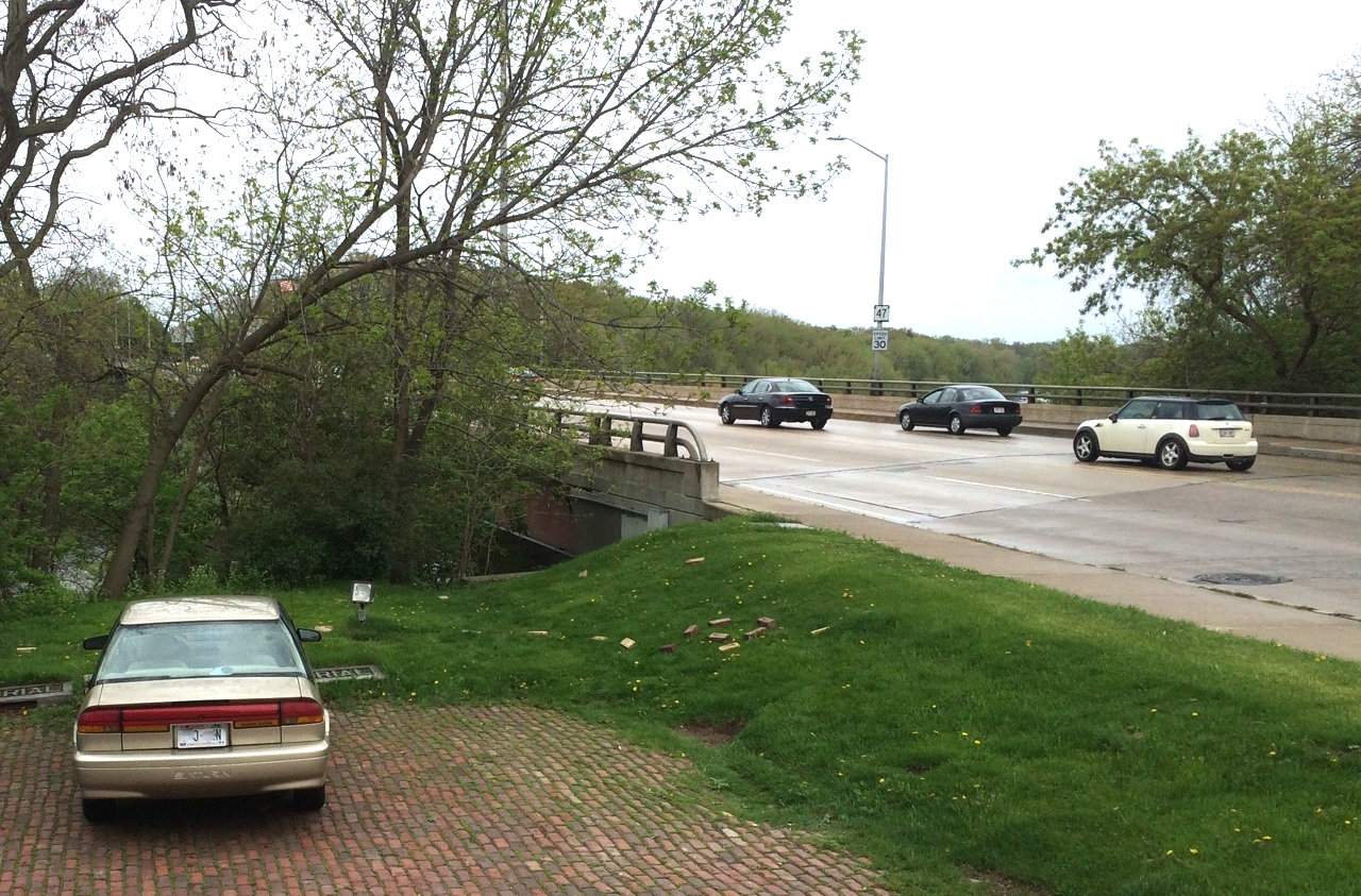 Current: The original landscape gave way to Memorial Bridge. The Fox River is just visible through the trees on the left.