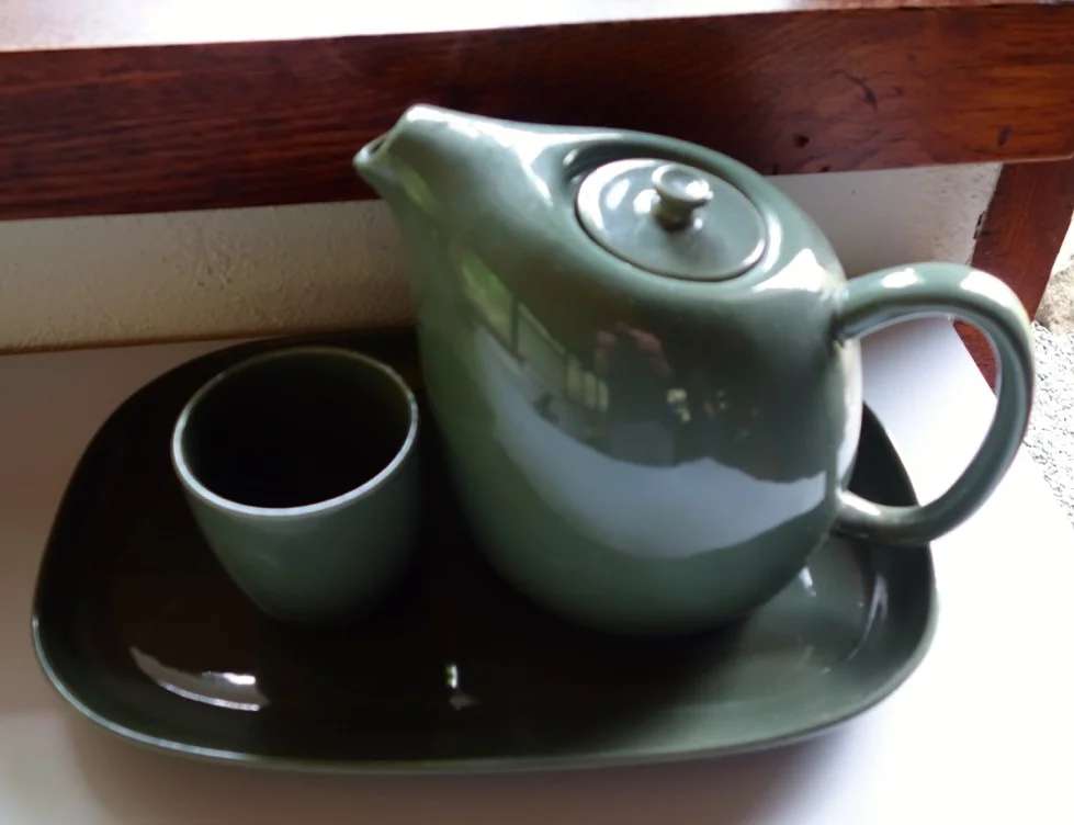 A tea pot, cup and platter from Wright's American Modern collection sits in his studio.