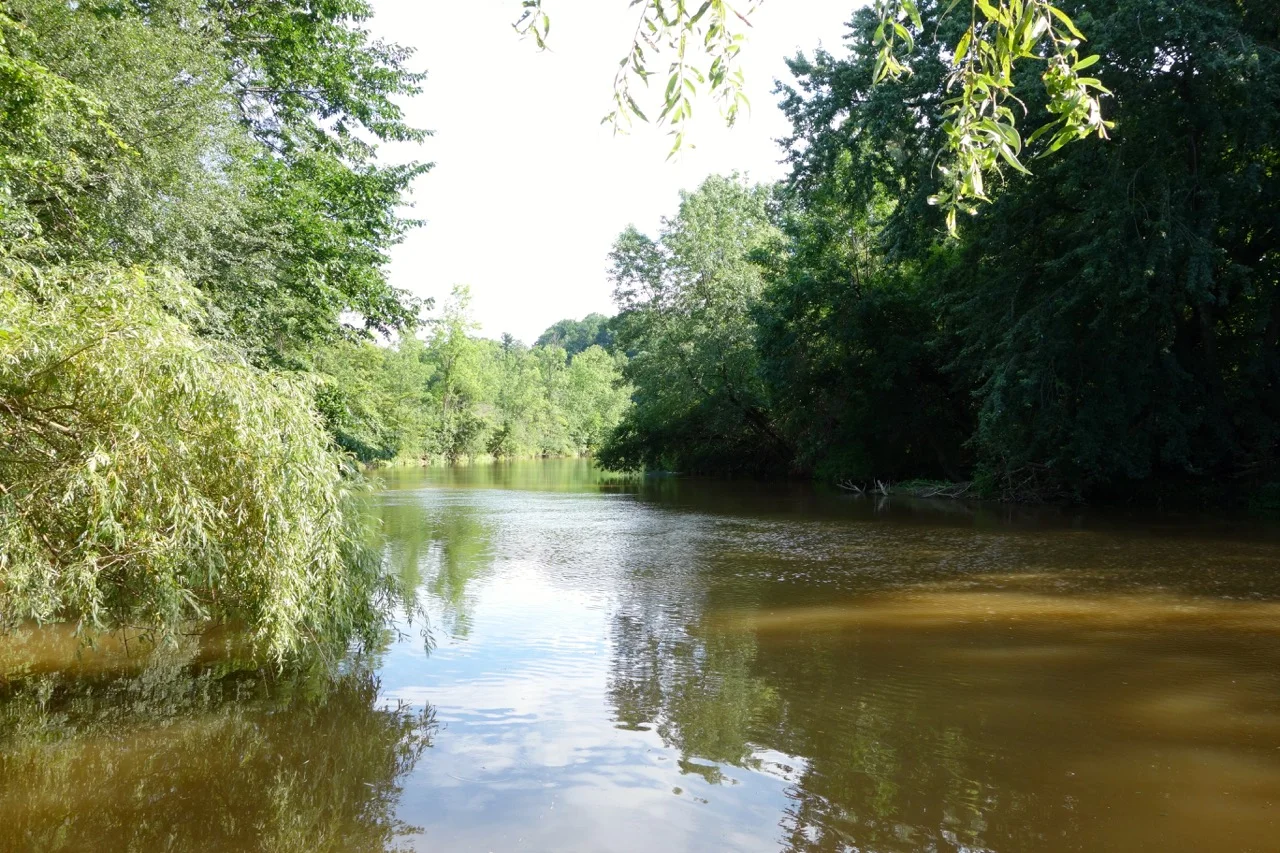 View of the Sheboygan River from behind the Sunken Garden.