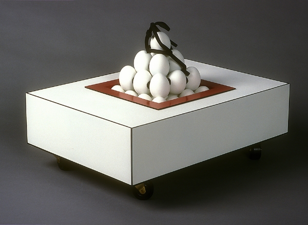 Abject, 13"x 14"x 14", eggs, cast plastic, paint, plexiglas, 1997 (SOLD)